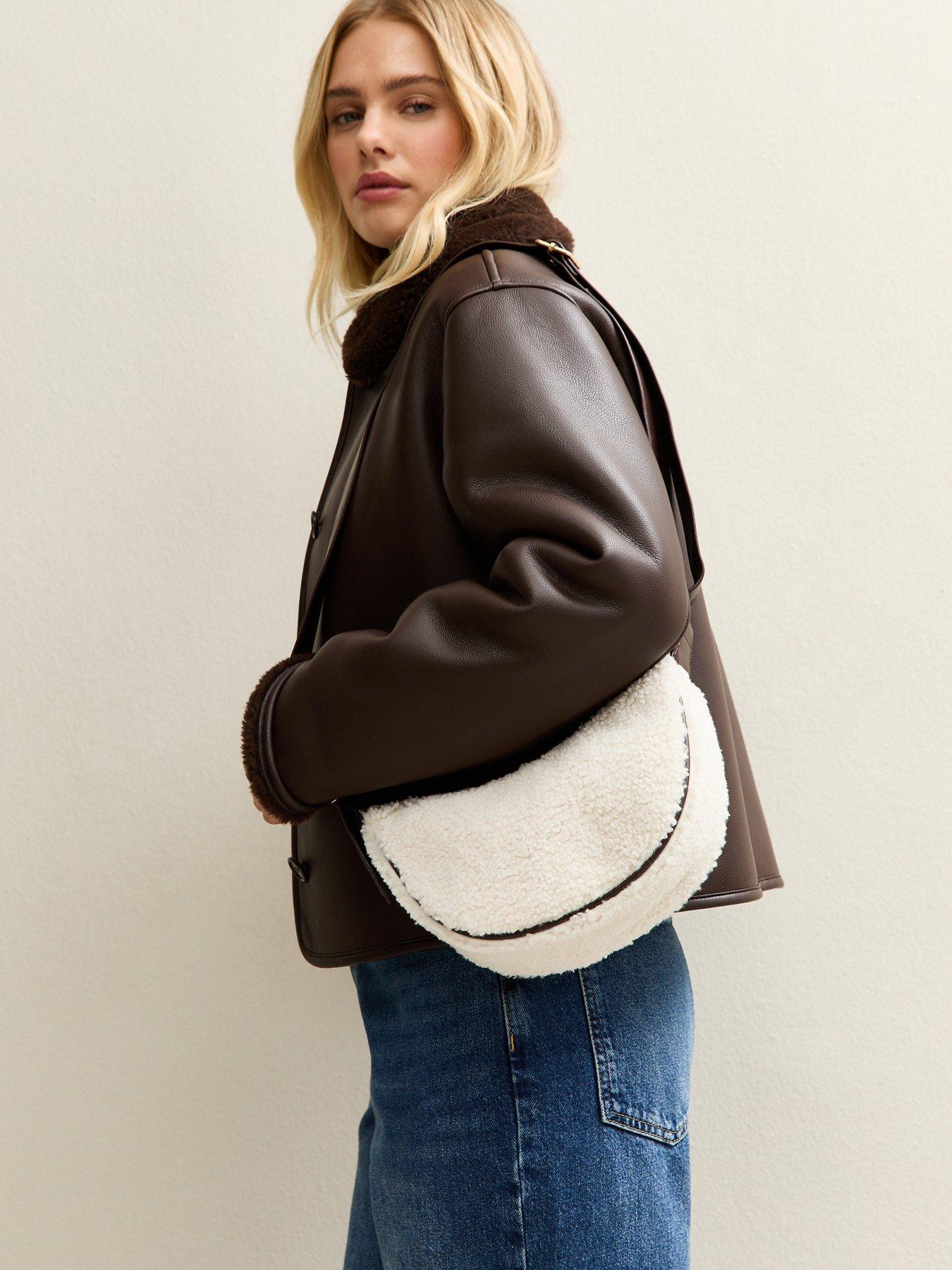 Image 1 of 5 of New Look Off White Borg Sling Cross Body Bag