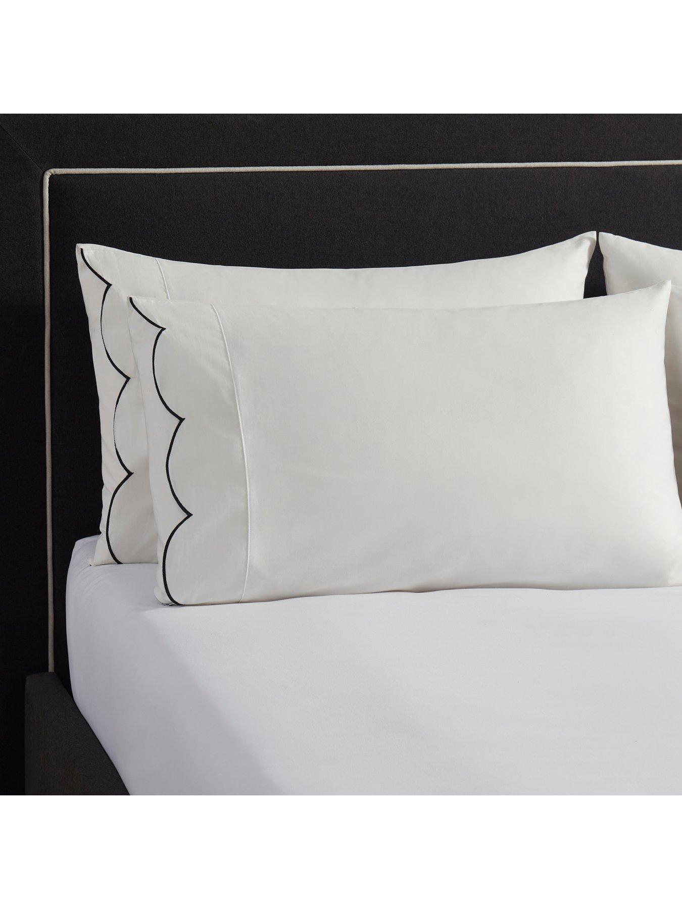  image of dusk-simone-scallop-embroidered-edge-classic-pillowcases--off-whiteblack