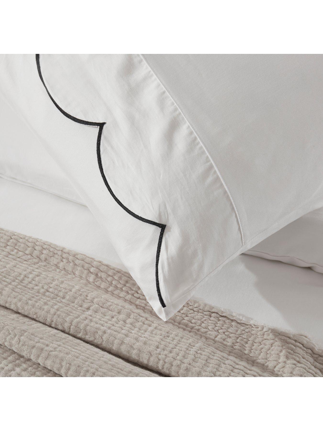  image of dusk-simone-scallop-embroidered-edge-classic-pillowcases--off-whiteblack