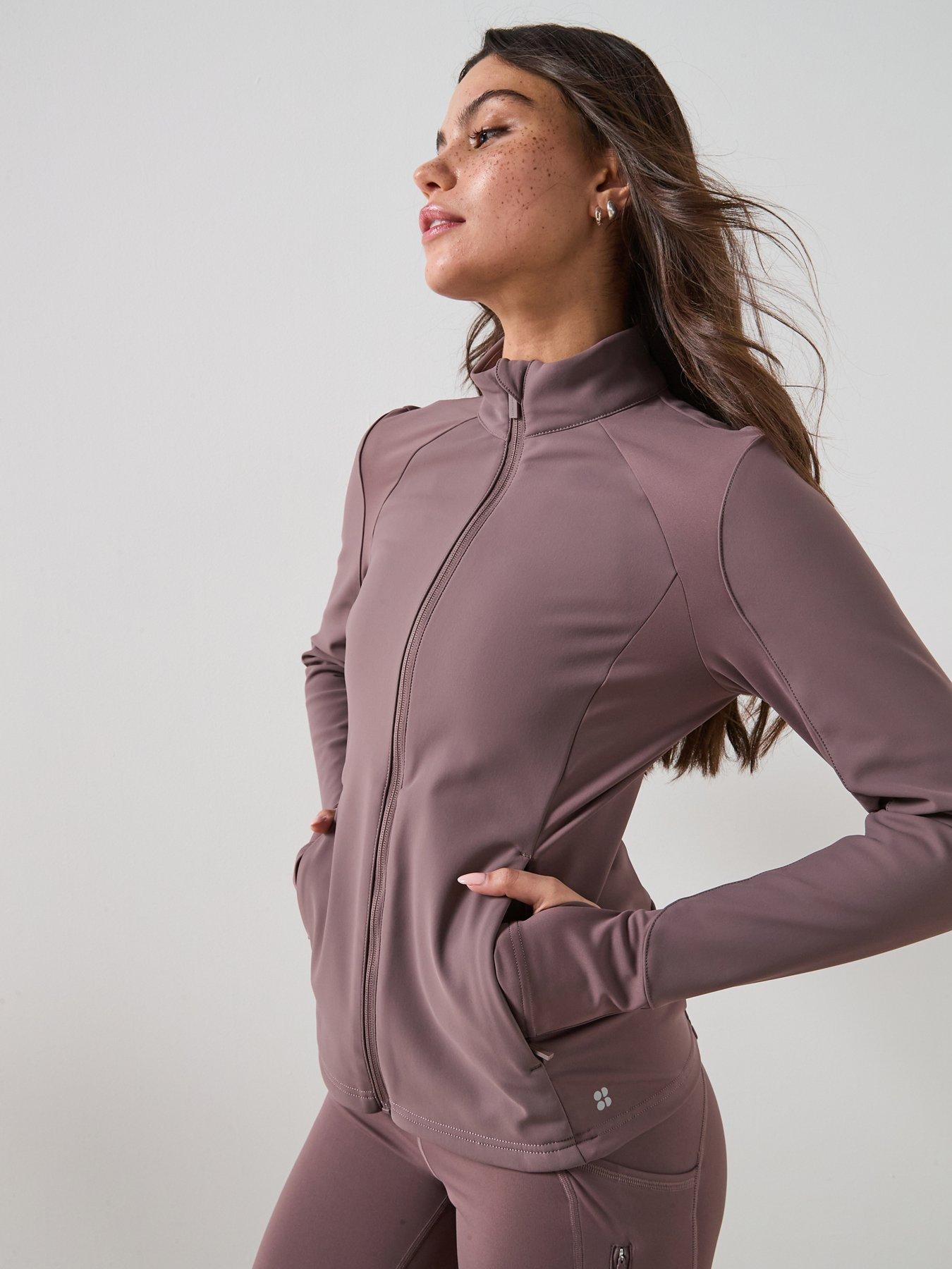 front image of sweaty-betty-womens-training-winter-power-softshell-jacket-brown