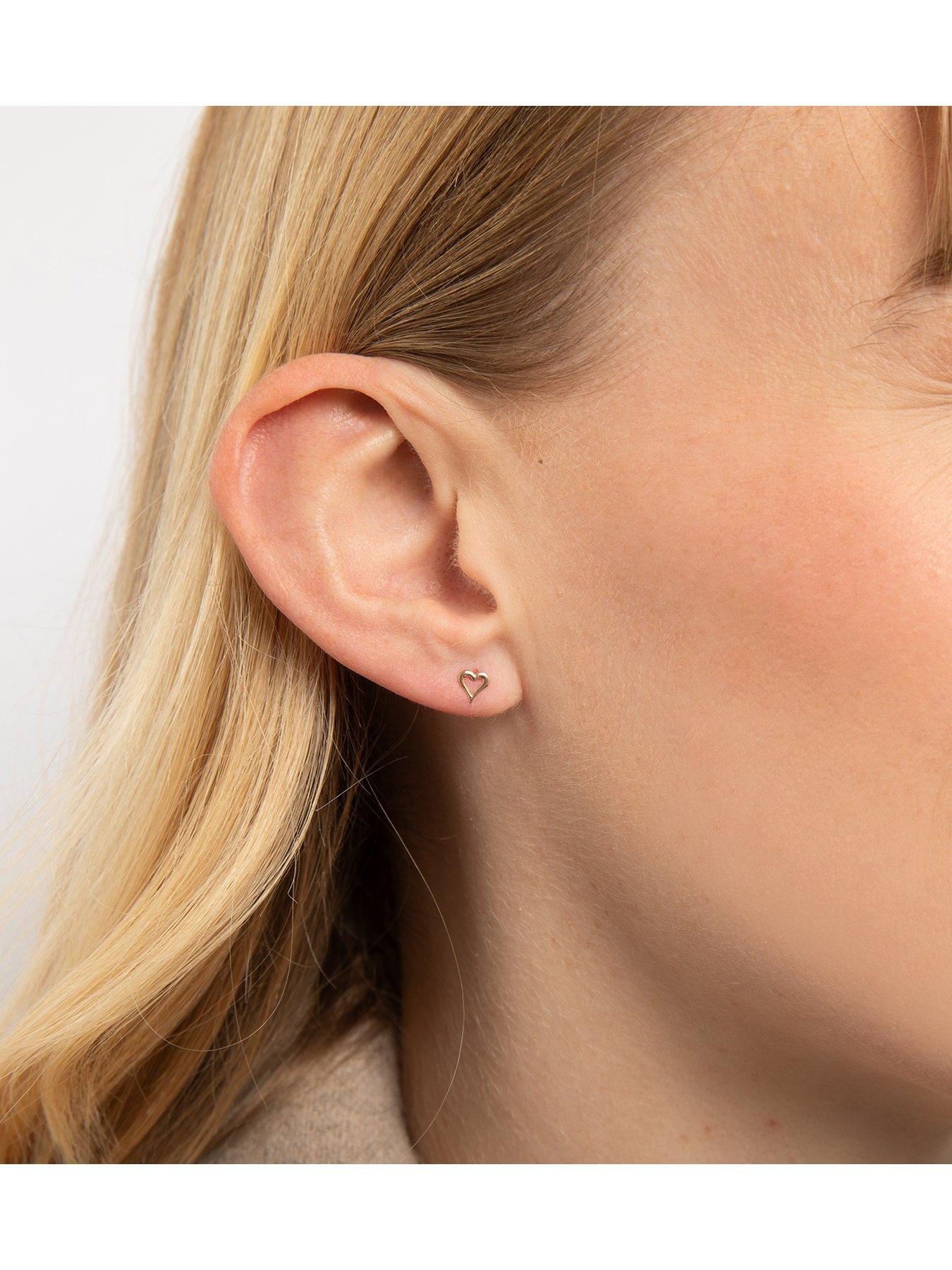 Image 2 of 4 of The Love Collection 9ct yellow gold small pierced heart stud earrings