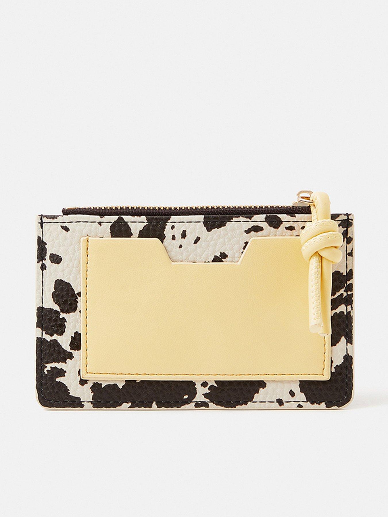 Image 1 of 3 of Accessorize Cow Print Cardholder - Multi