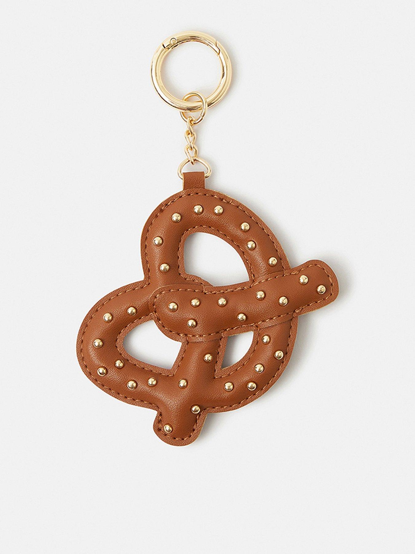 Image 1 of 3 of Accessorize Pretzel Bag Charm - Brown