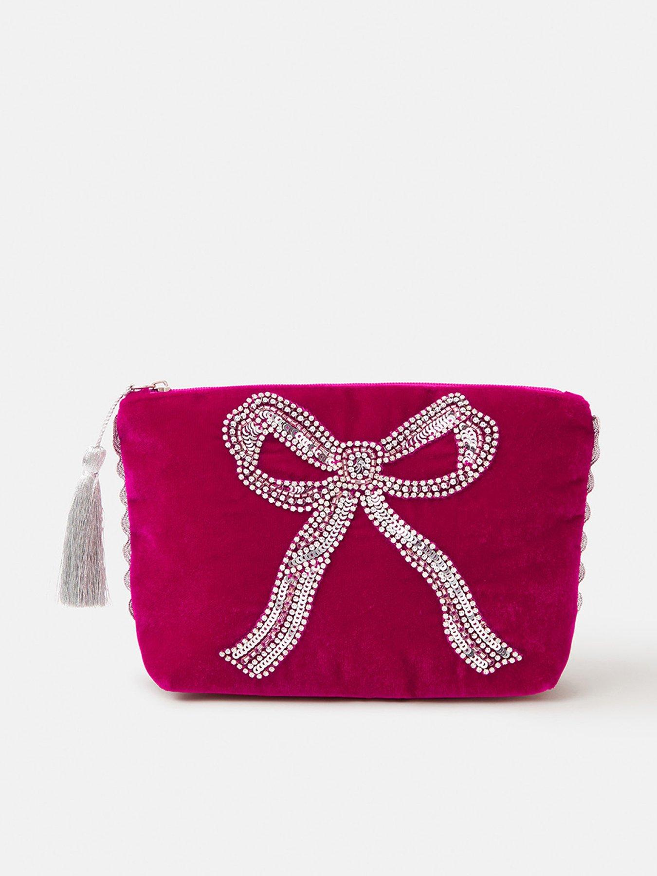  image of accessorize-sequin-bow-velvet-pouch-bag-pink