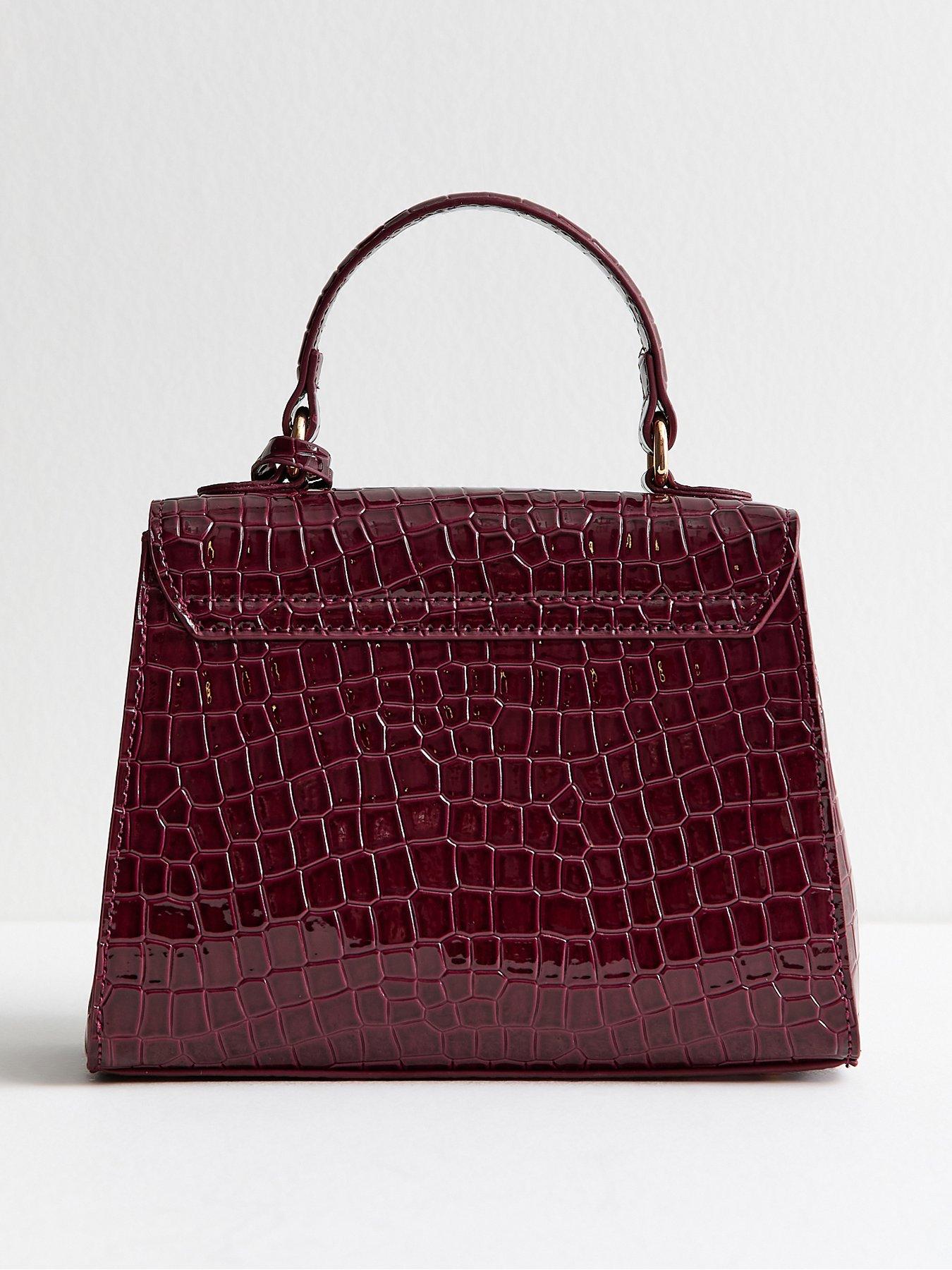  image of new-look-midi-tyla-croc-top-handle-bag-burgundy