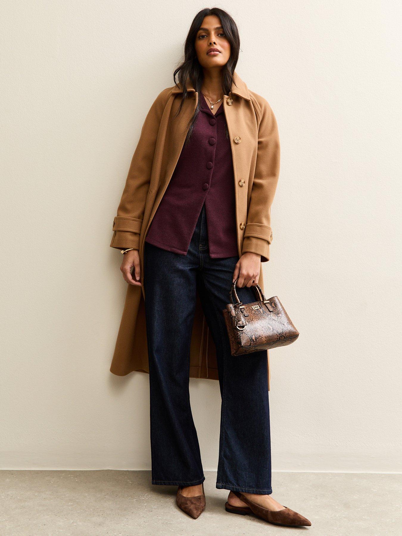  image of new-look-soft-touch-compact-knit-split-front-waistcoat-burgundy