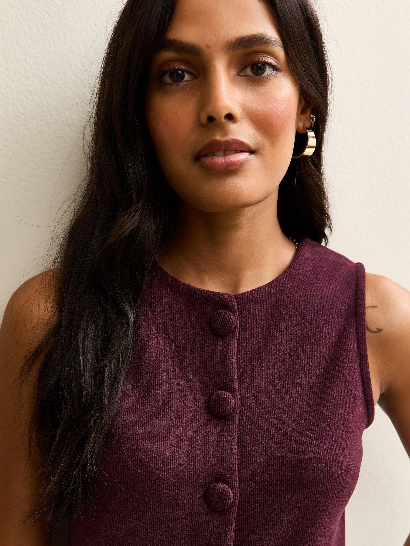  image of new-look-soft-touch-compact-knit-split-front-waistcoat-burgundy