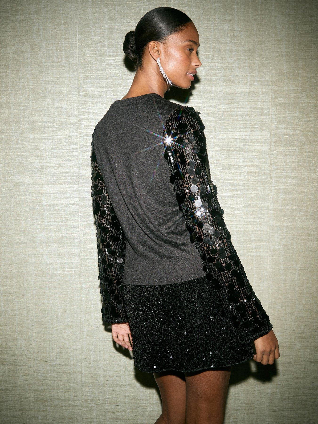  image of new-look-soft-touch-crew-neck-sparkle-flare-sleeve-top-black