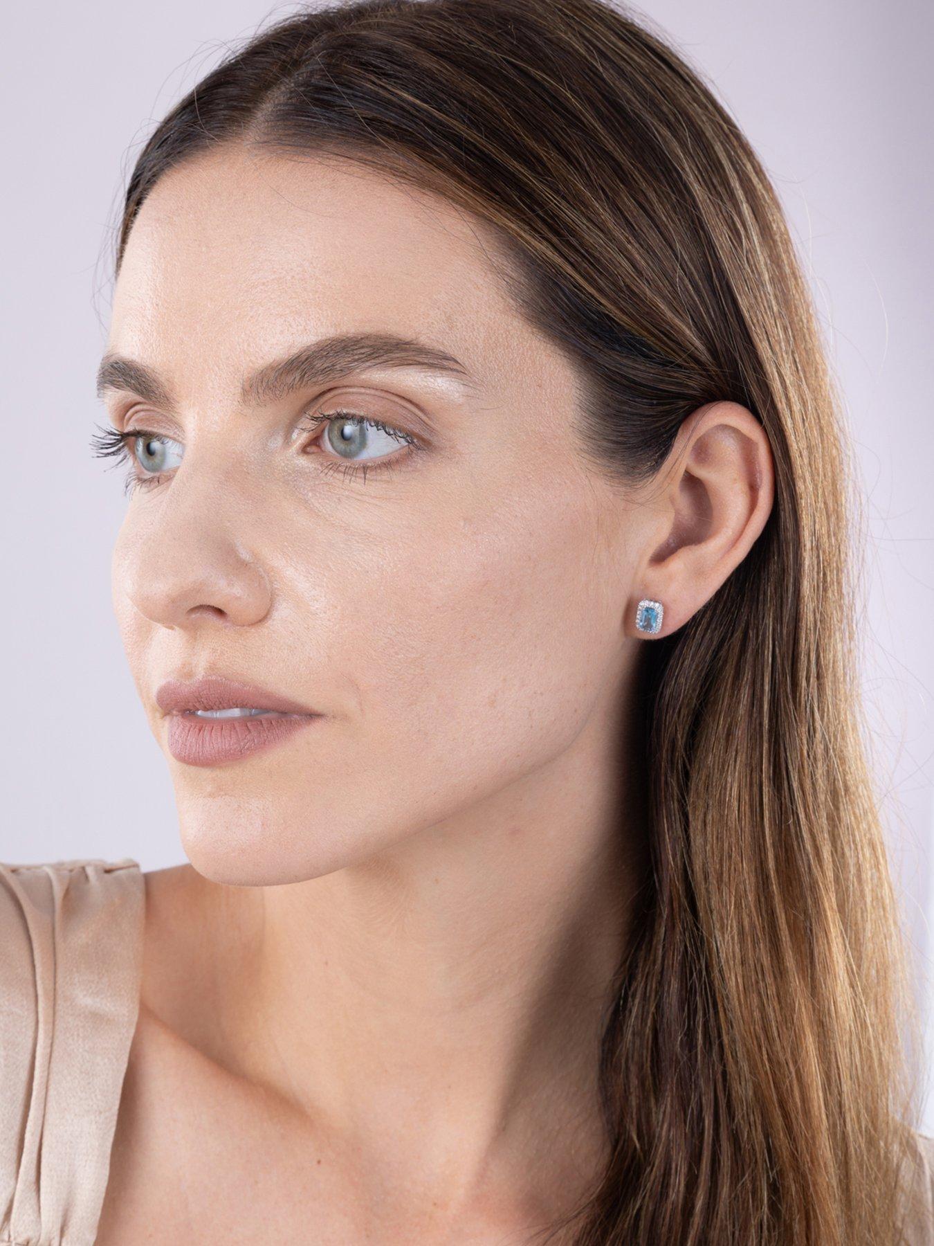 Image 4 of 5 of Love DIAMOND Swiss Blue Topaz &amp; 0.14ct Natural Diamond Emerald Cut Studs