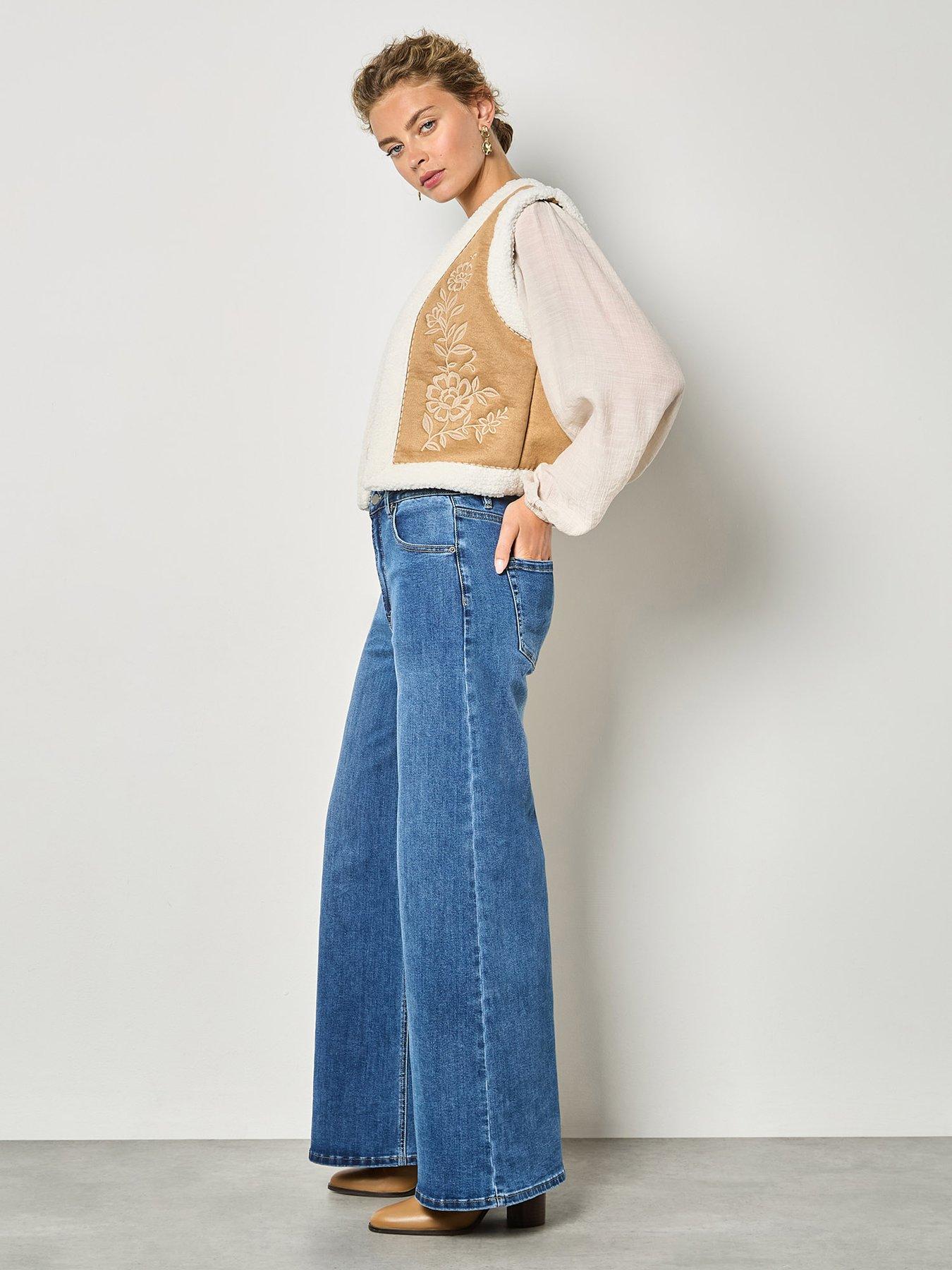  image of apricot-floral-suede-embroidered-teddy-gilet-brown