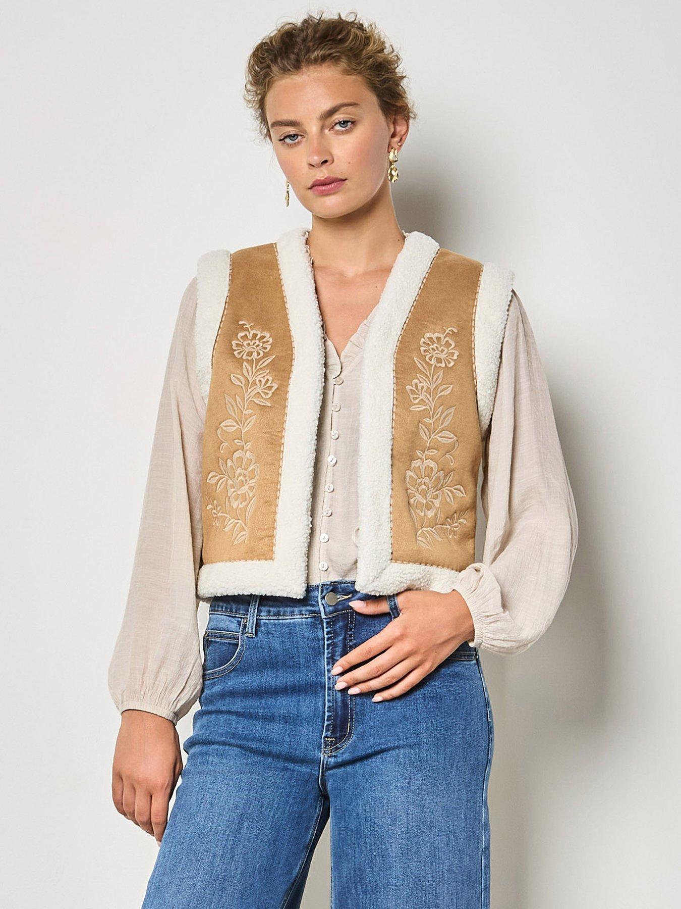  image of apricot-floral-suede-embroidered-teddy-gilet-brown