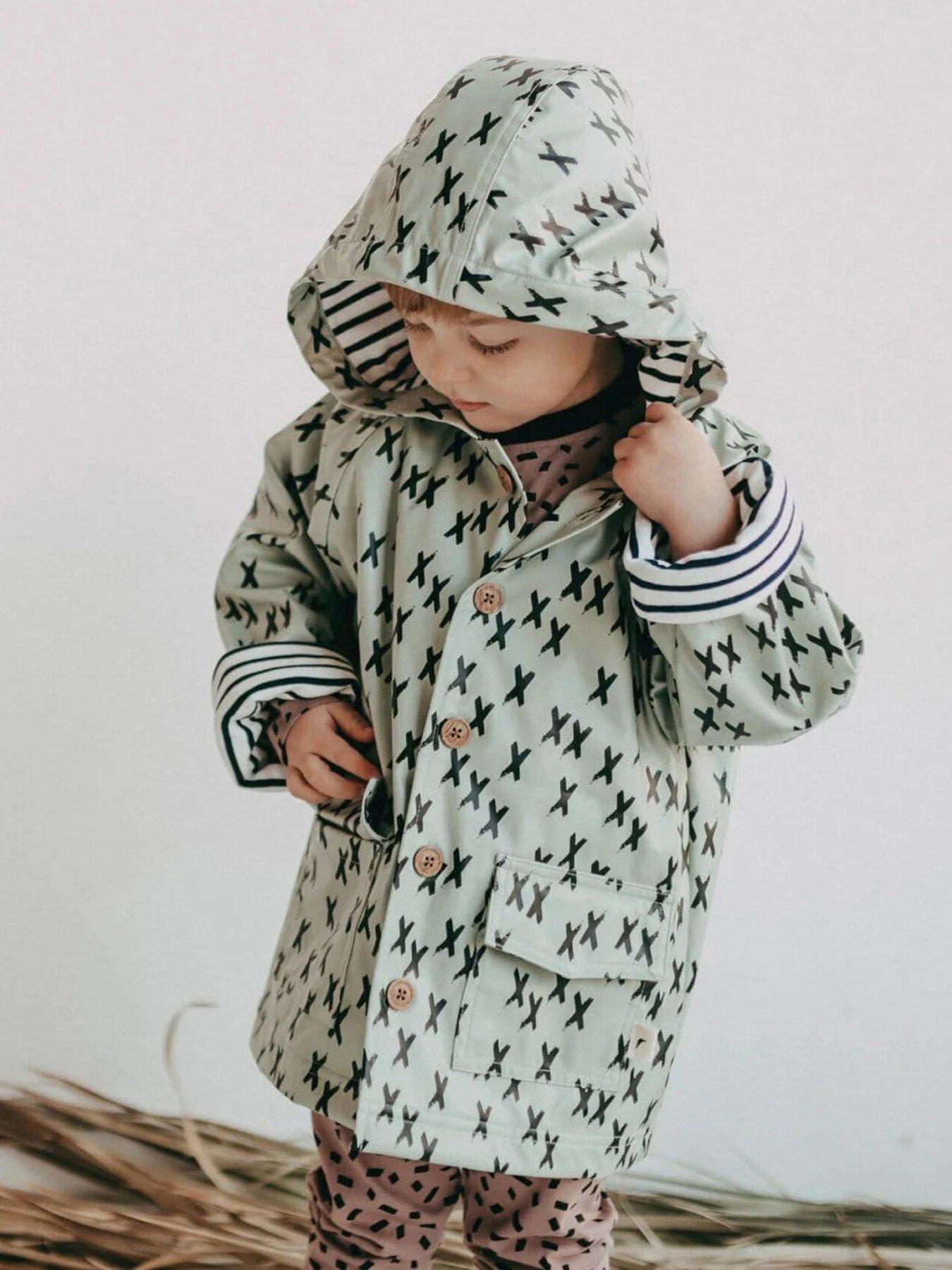 image of turtledove-london-kids-green-kisses-print-hooded-raincoat-light-green