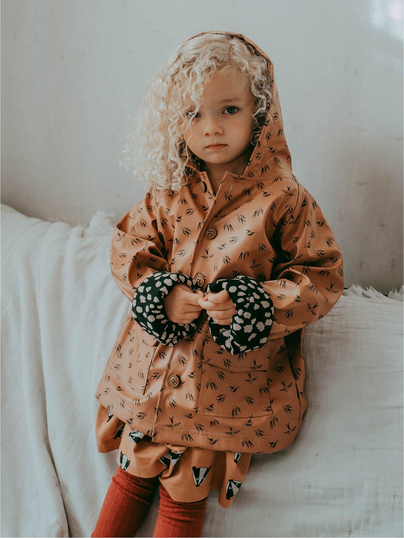 Image 1 of 5 of Turtledove London Kids Orange Dancing Bird Print Hooded Raincoat
