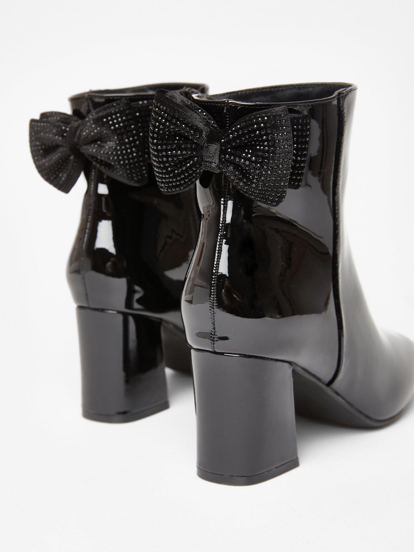 Image 4 of 5 of Quiz Black Patent Bow Back Ankle Boot