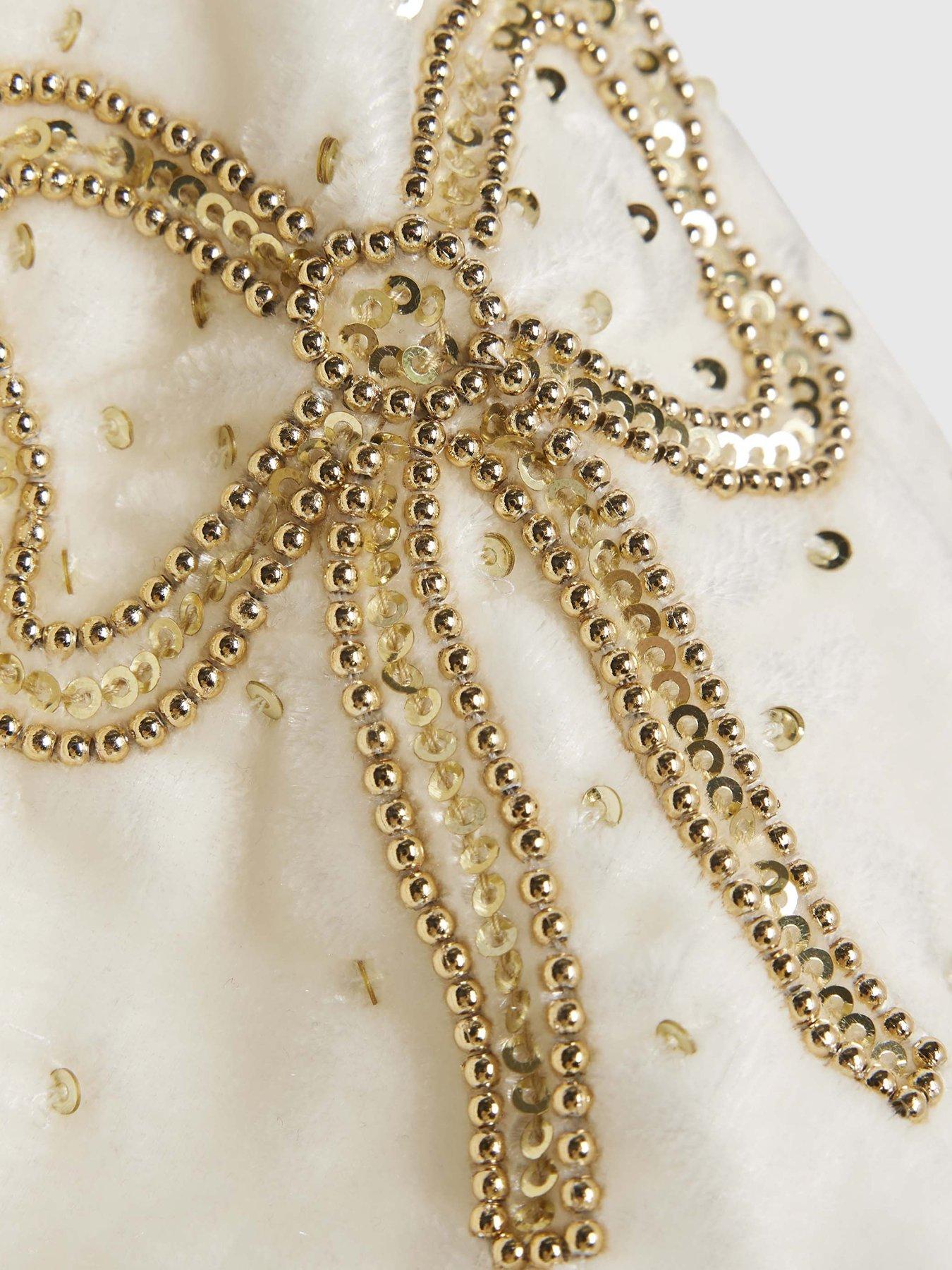  image of river-island-older-girls-velvet-bow-embellished-playsuit-cream