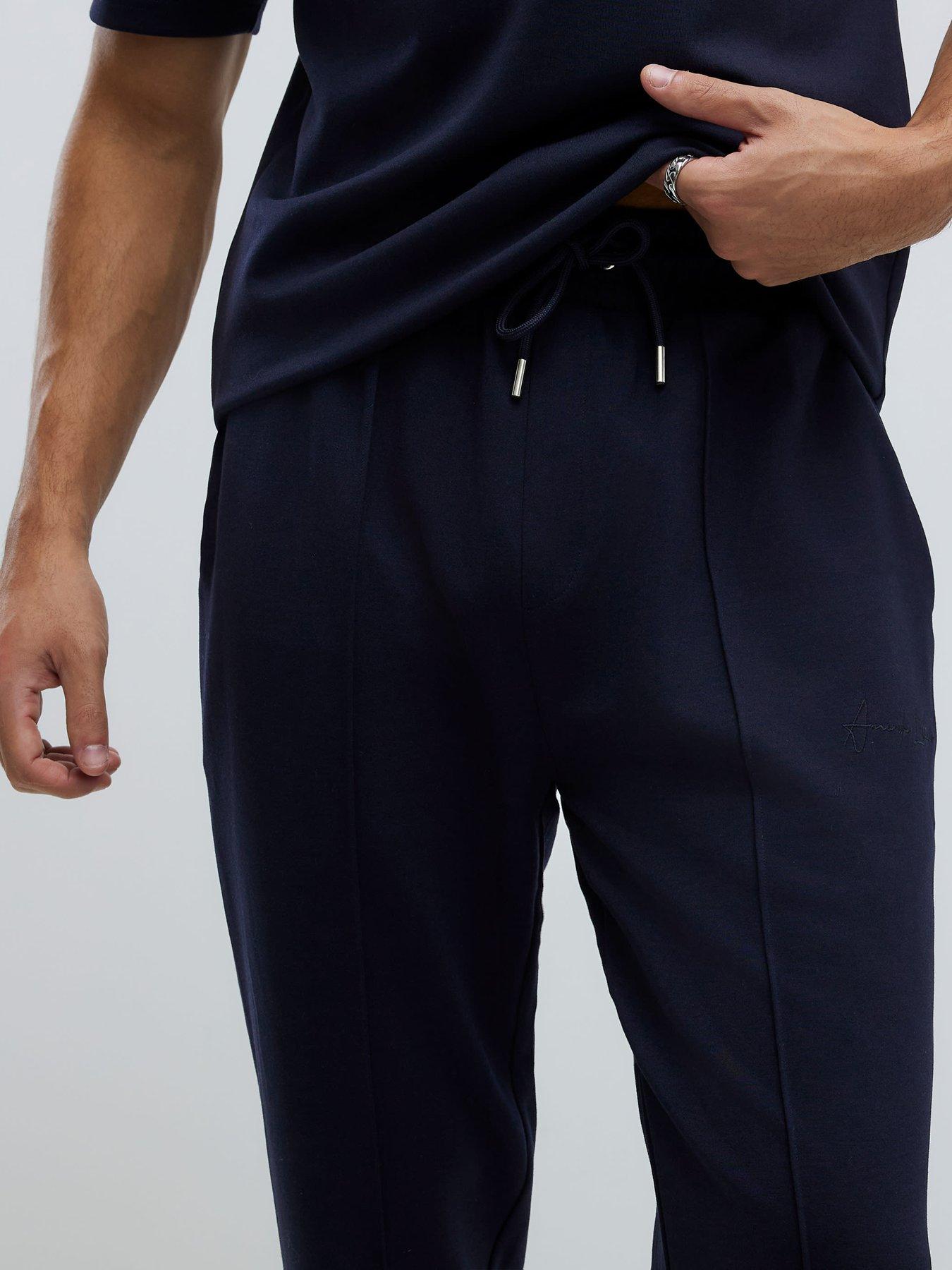 Image 4 of 6 of River Island Slim Interlock Pintuck Joggers - Navy
