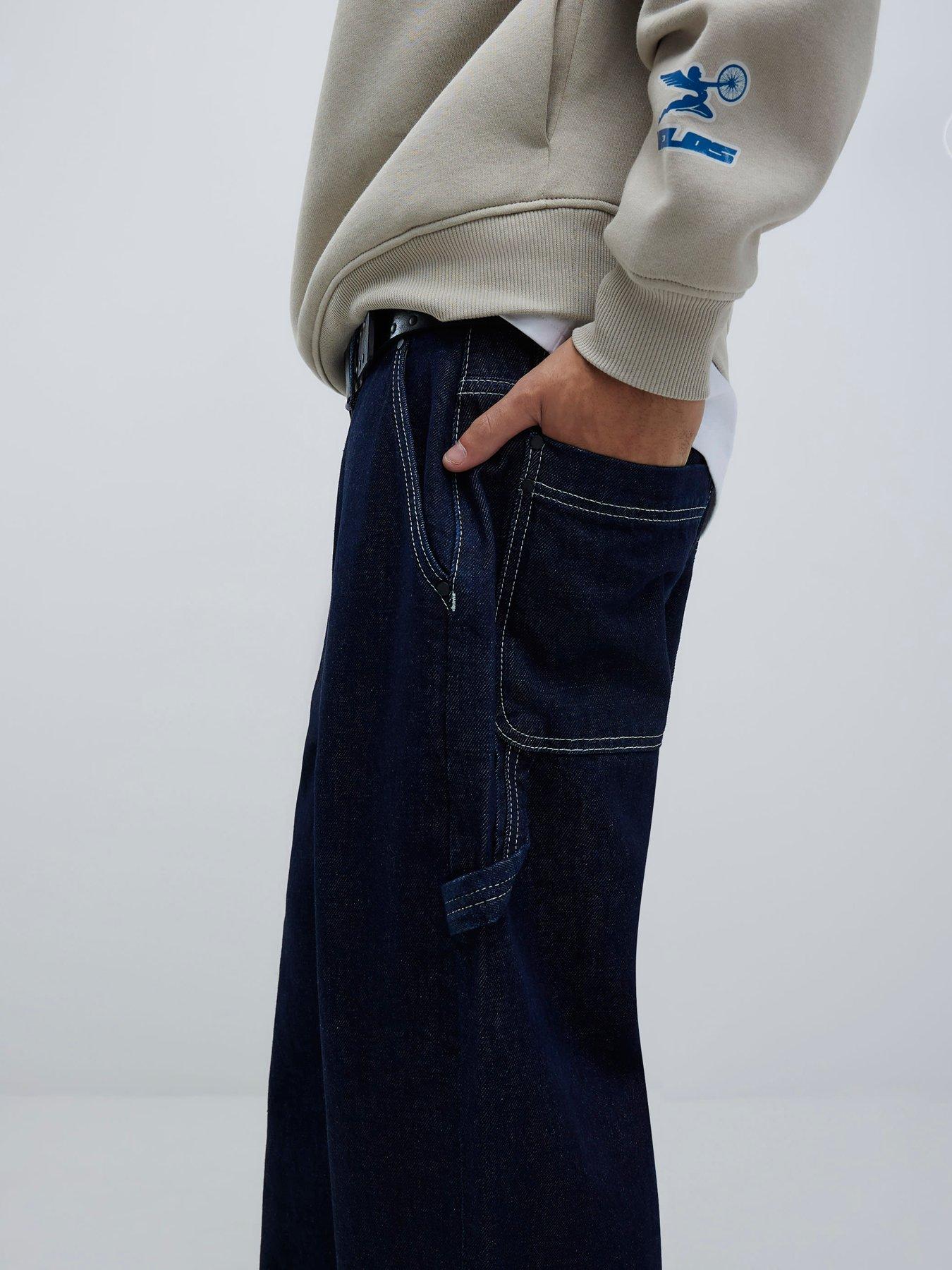 Image 4 of 6 of River Island Dark Montano Baggy Carpenter Jeans - Blue