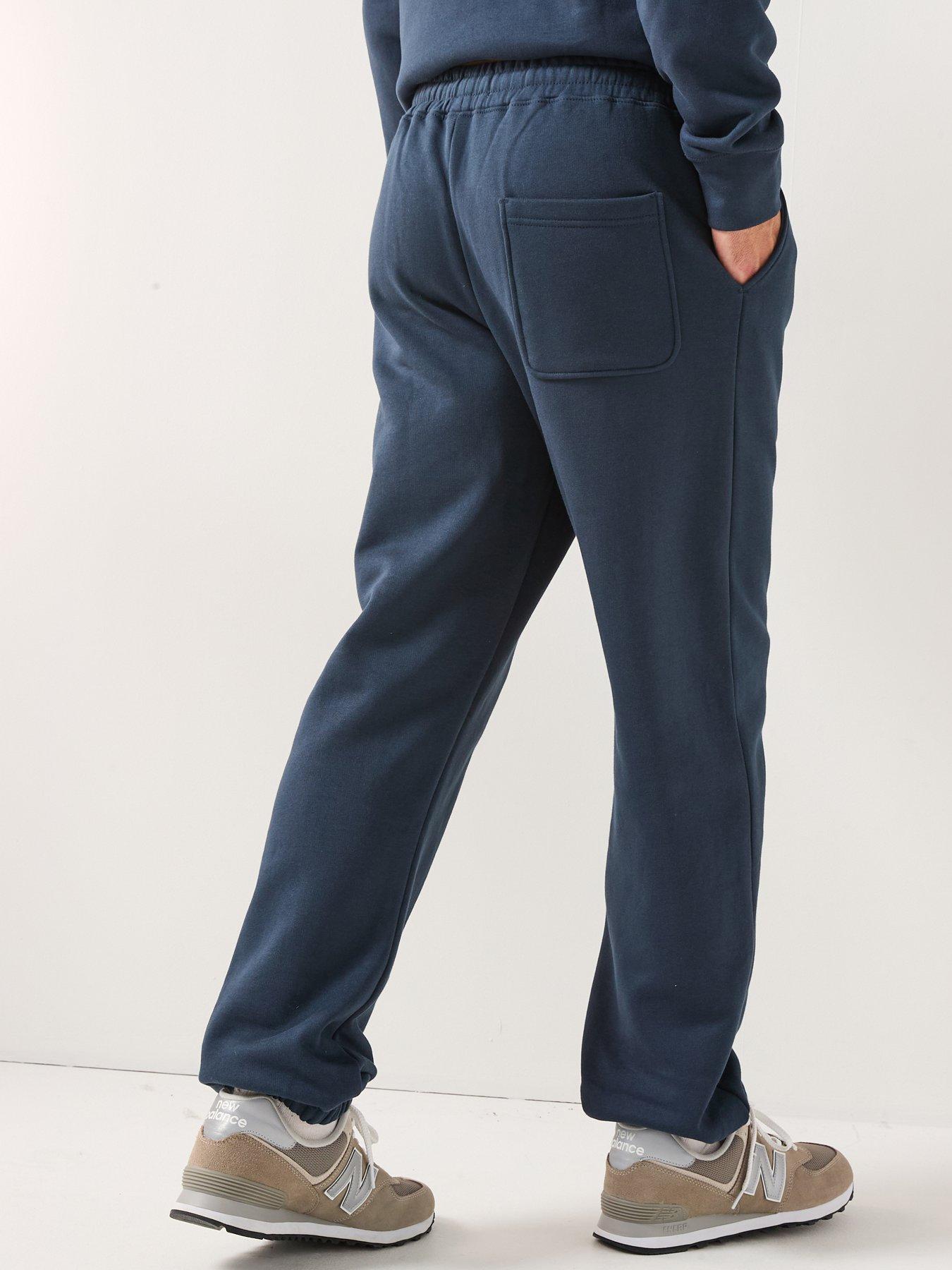 stillFront image of double-a-by-wood-wood-cal-coin-logo-cuff-joggers-navy