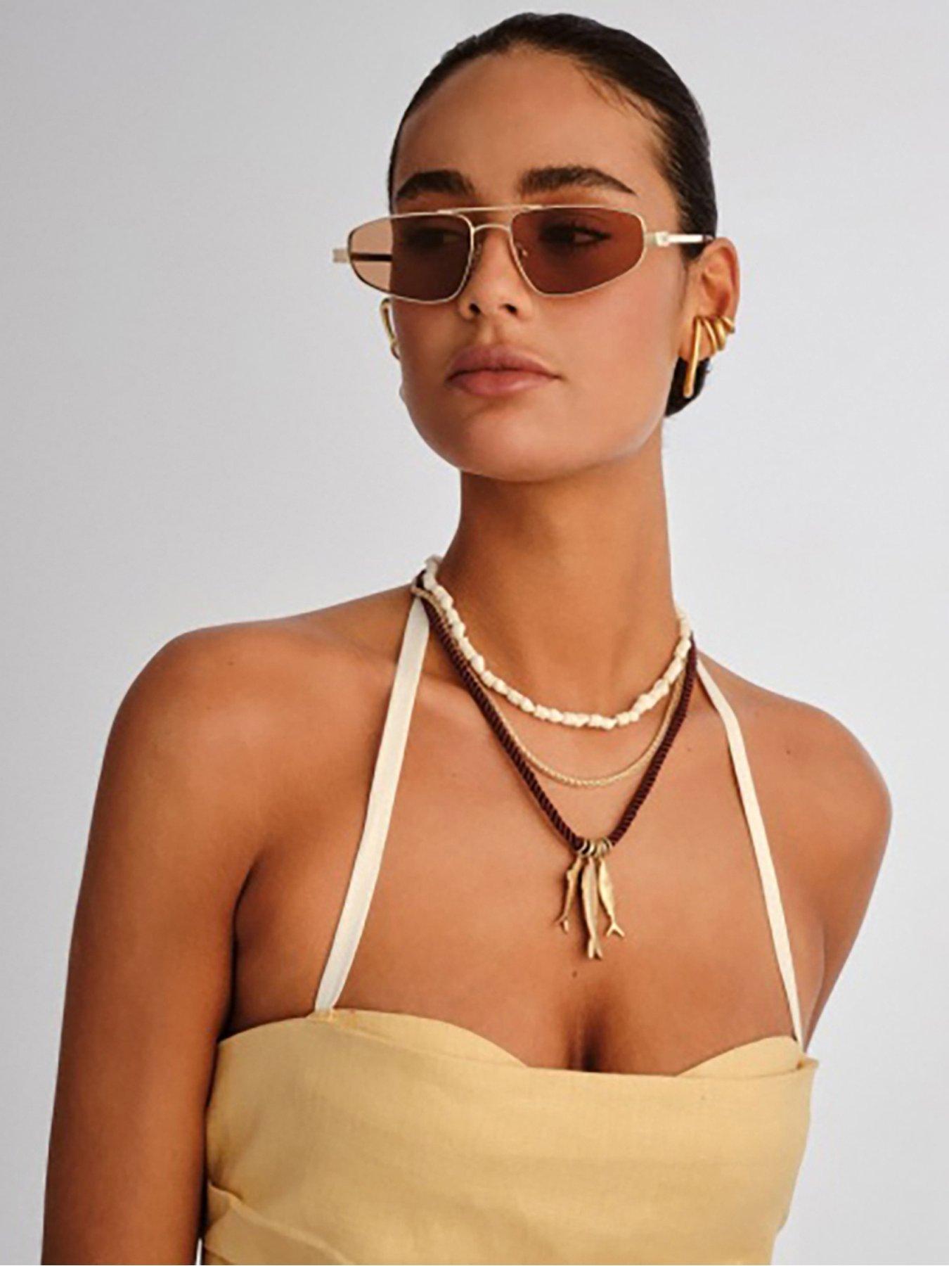  image of le-specs-treasure-aviator-sunglasses-gold
