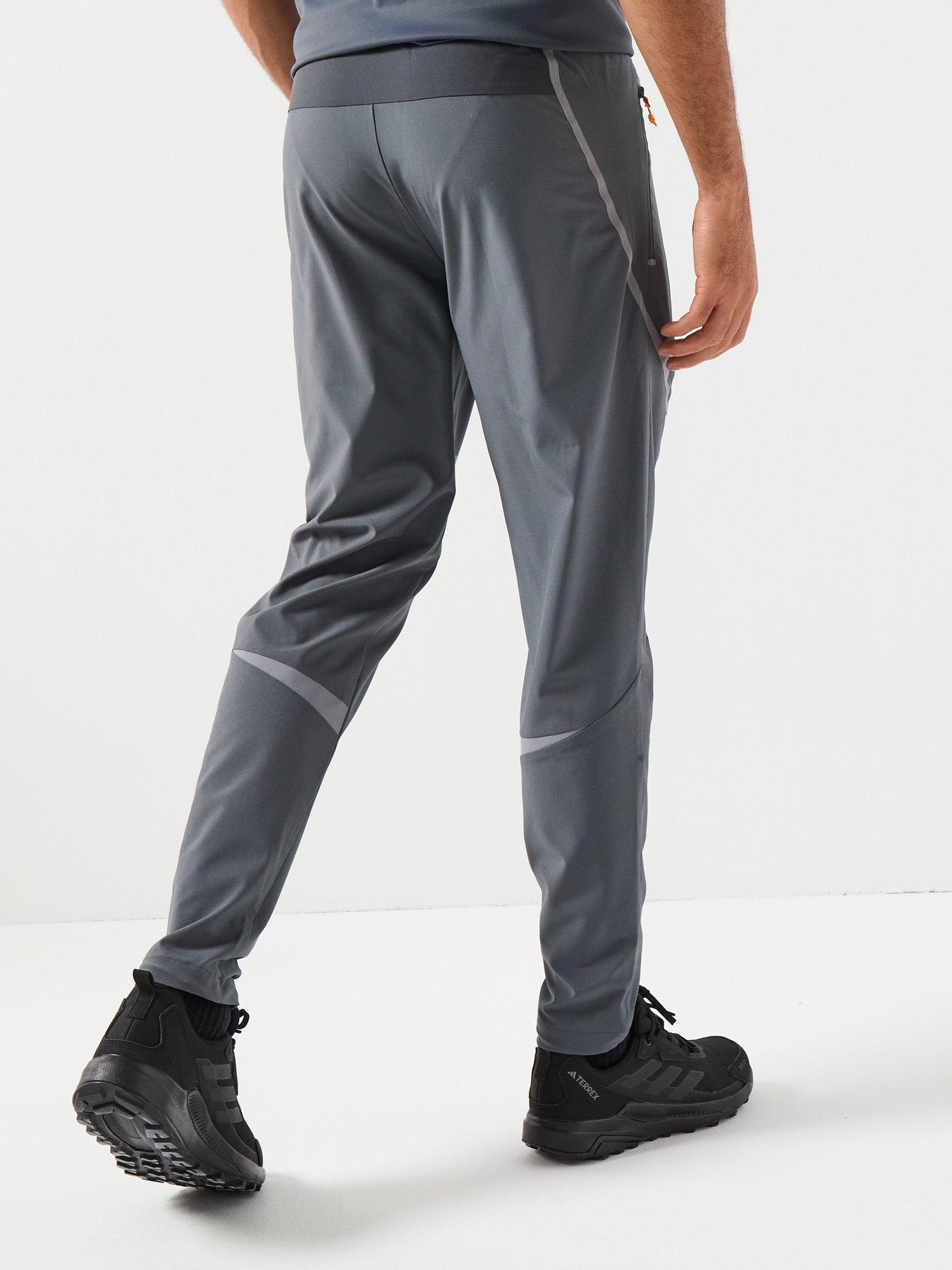  image of monterrain-mens-defence-woven-running-pant-iron-gate-asphalt-night-owl-orange-pop