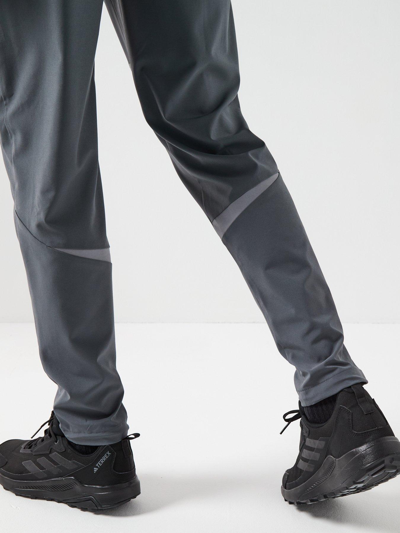  image of monterrain-mens-defence-woven-running-pant-iron-gate-asphalt-night-owl-orange-pop