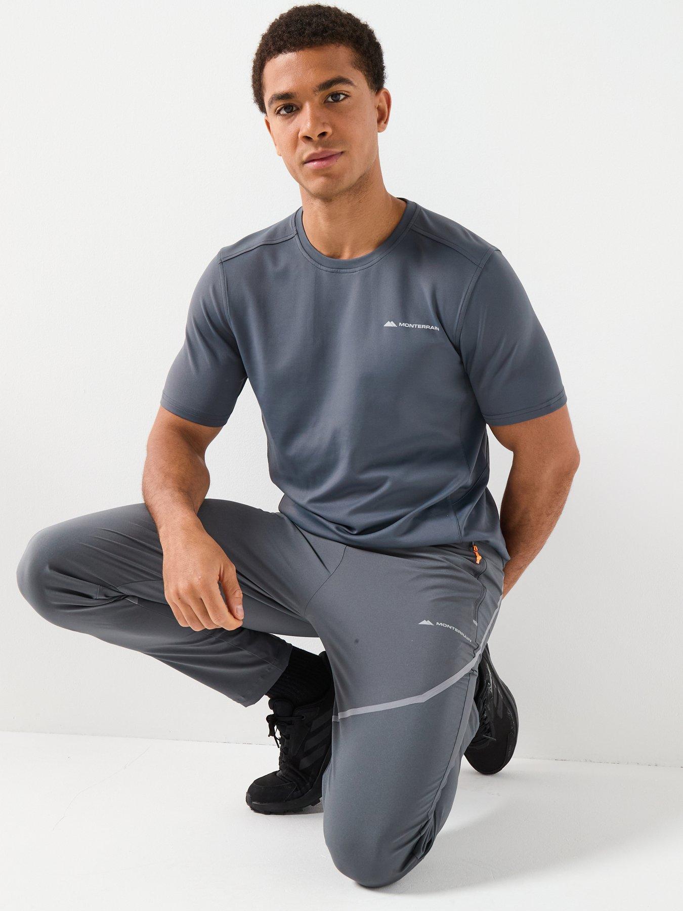  image of monterrain-mens-defence-woven-running-pant-iron-gate-asphalt-night-owl-orange-pop