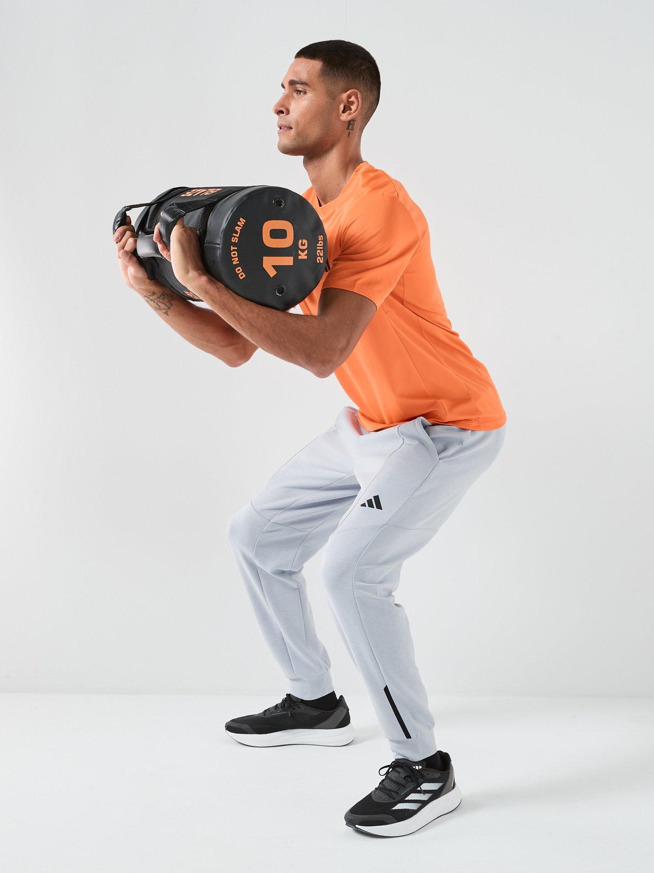  image of adidas-mens-training-workout-essentials-t-shirt-orange