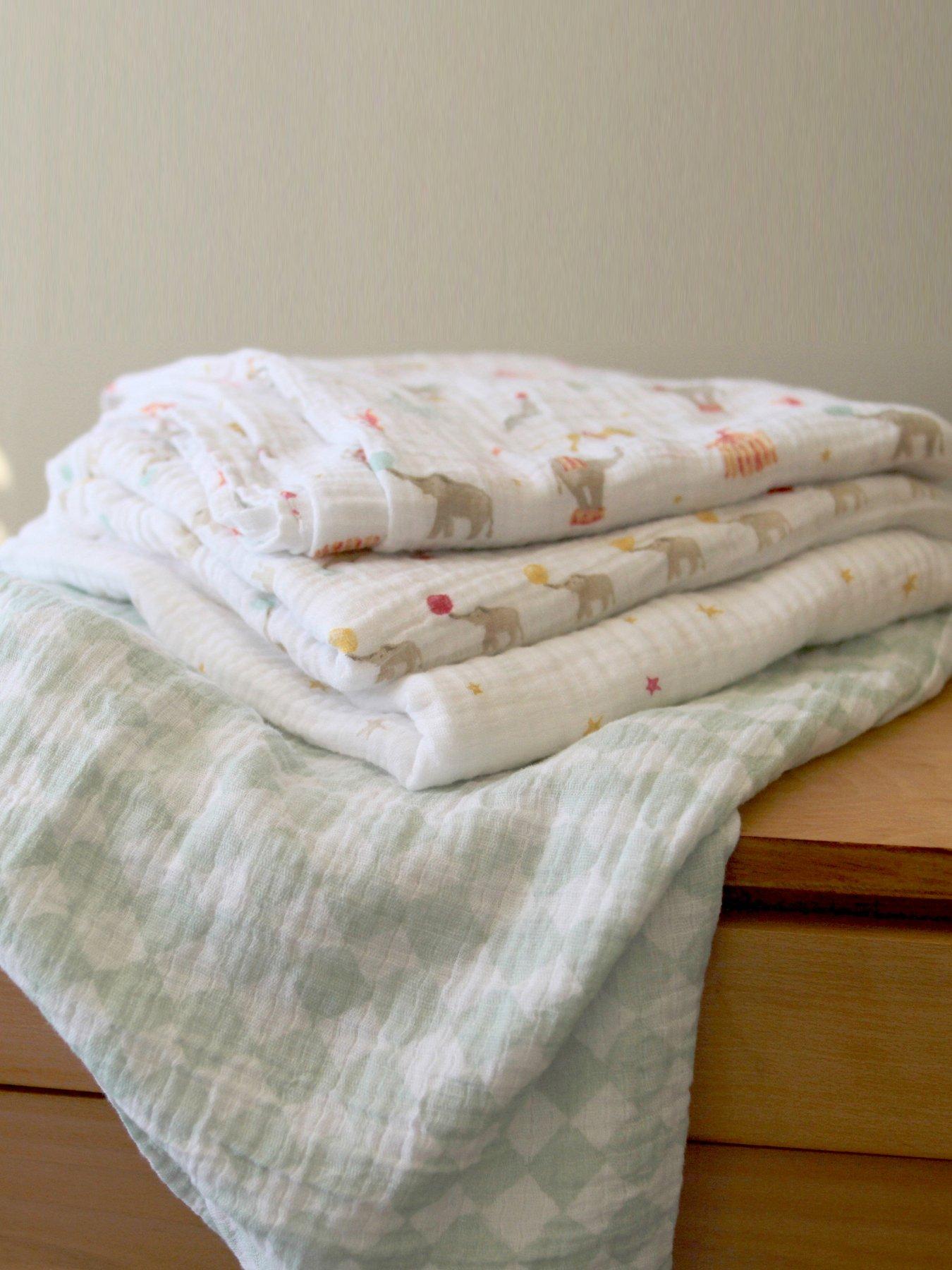  image of aden-anais-essential-cotton-muslin-4-pack-swaddle-blanket-elephant-circus