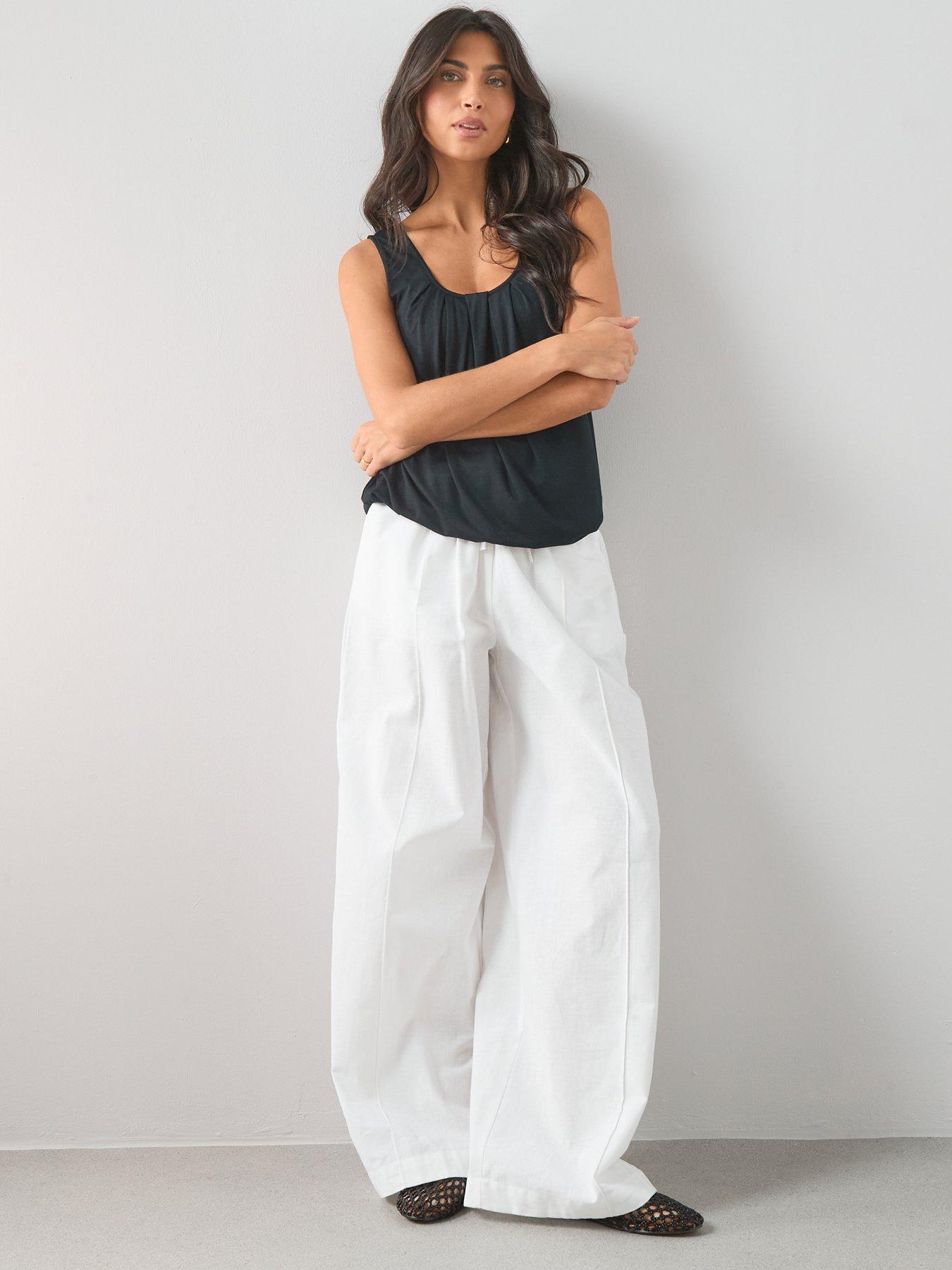  image of the-very-collection-stretch-bubble-hem-vest-black