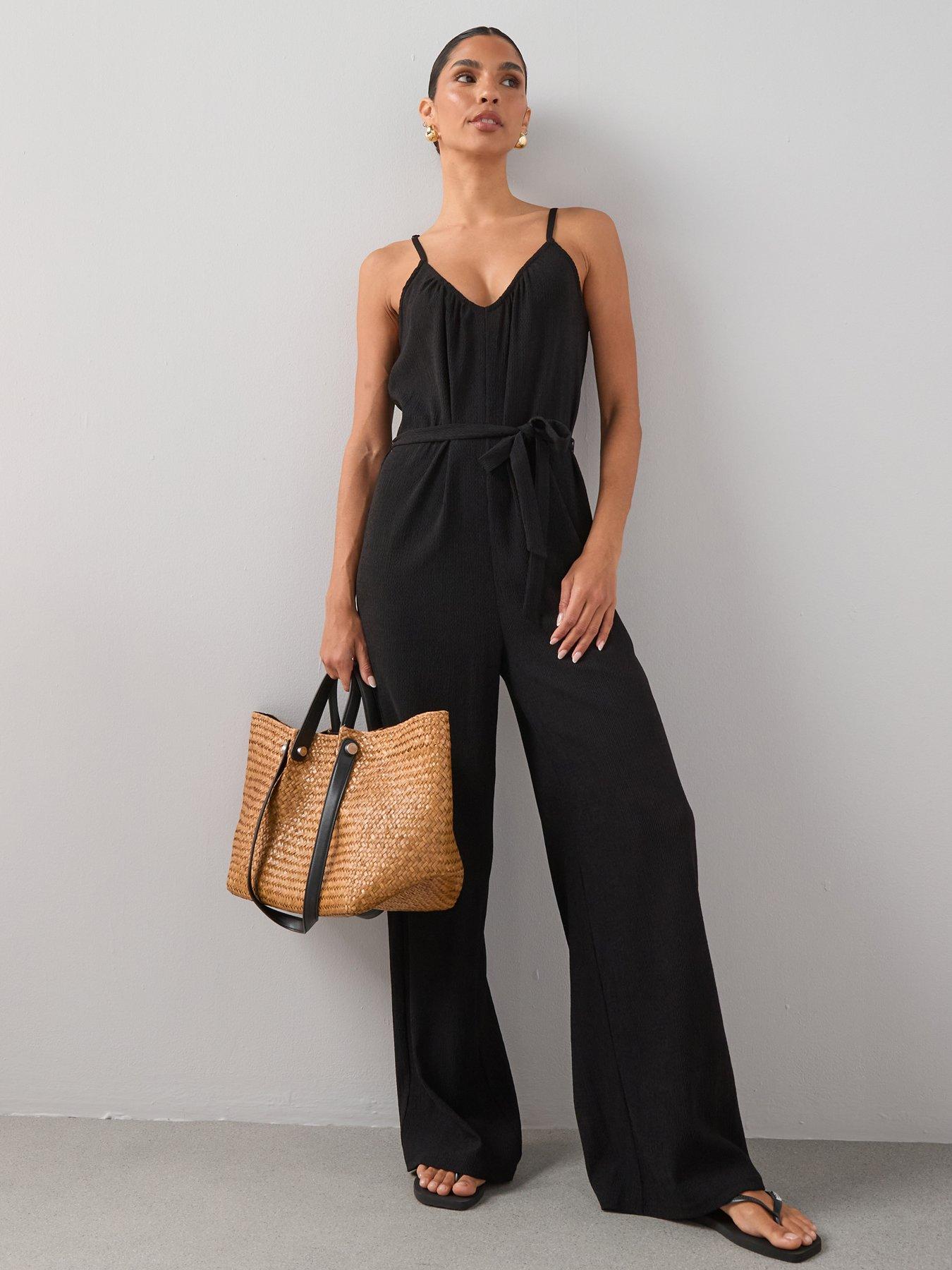 Image 1 of 7 of The Very Collection Textured Stretch Strappy Jumpsuit