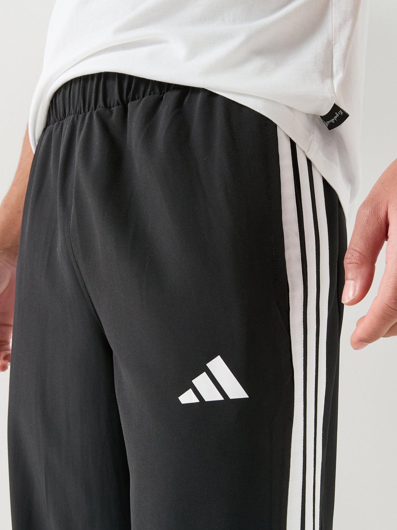  image of adidas-sportswear-mens-3-stripes-regular-fit-snap-woven-tracksuit-pants-black