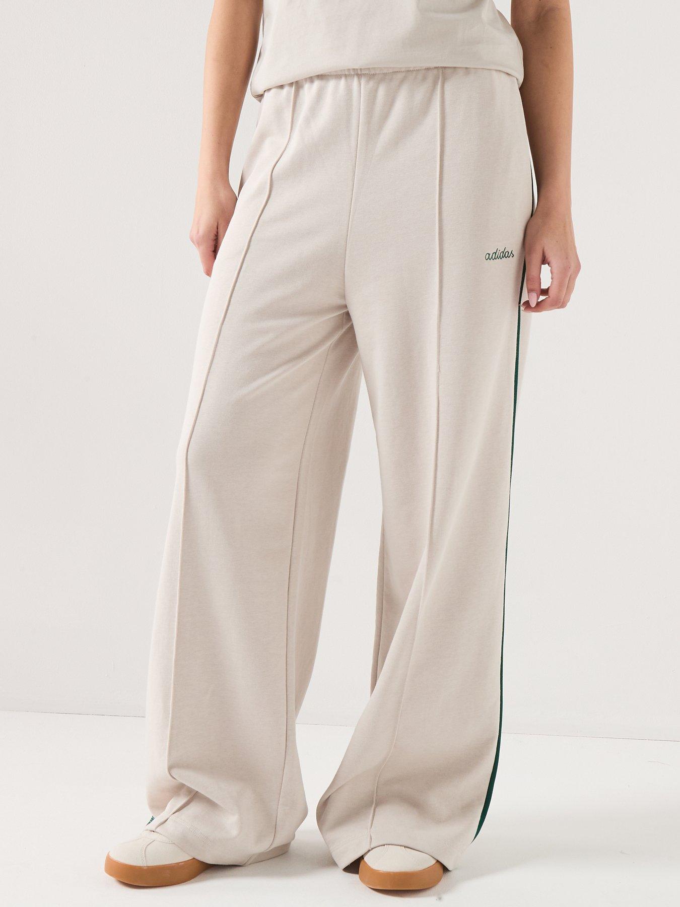 adidas-sportswear-womens-seasonal-essentials-colorpop-pants-with-embroidered-graphic-beige