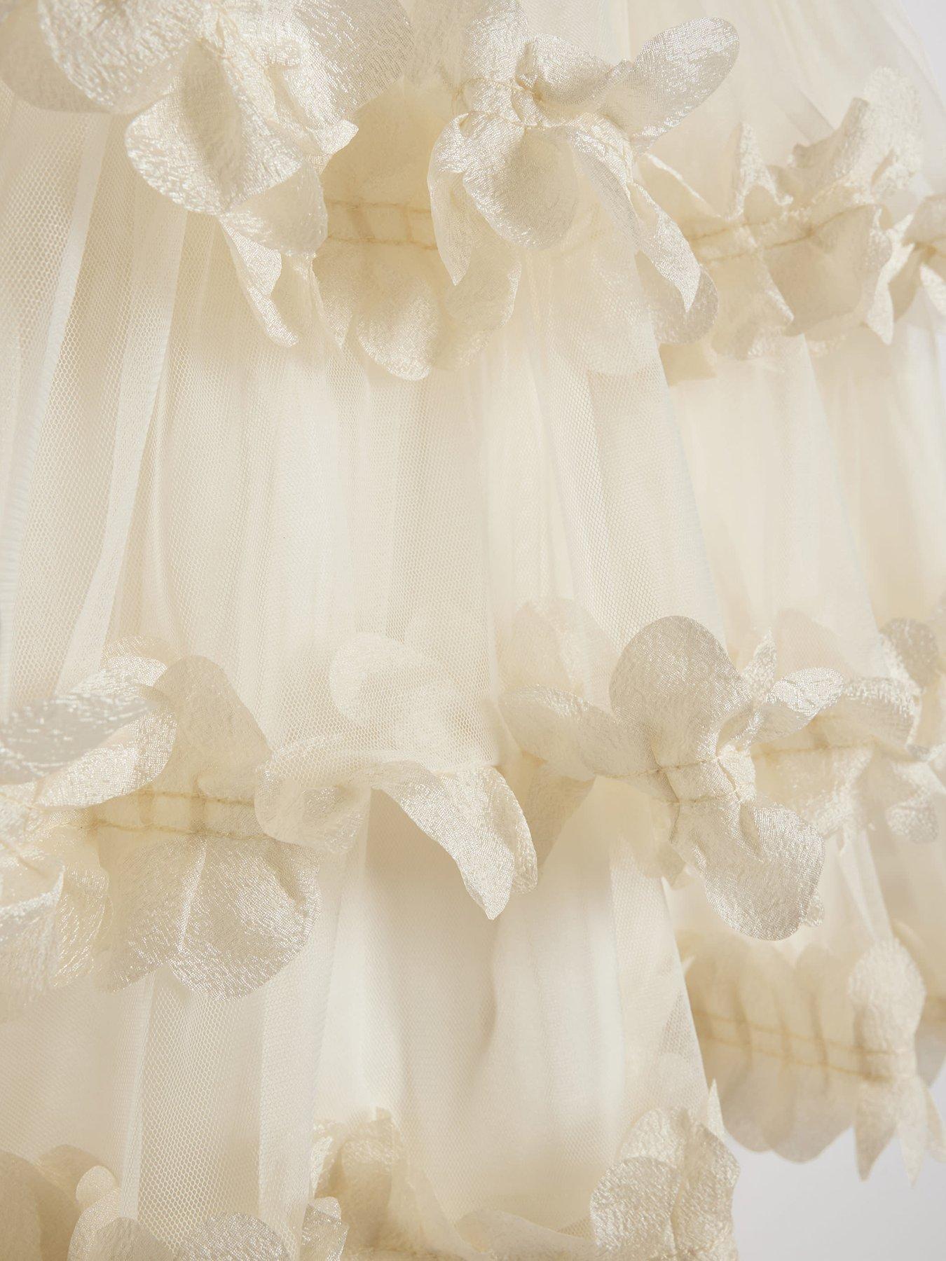 Image 4 of 4 of River Island Older Girls Tiered Bow Tulle Dress - Cream