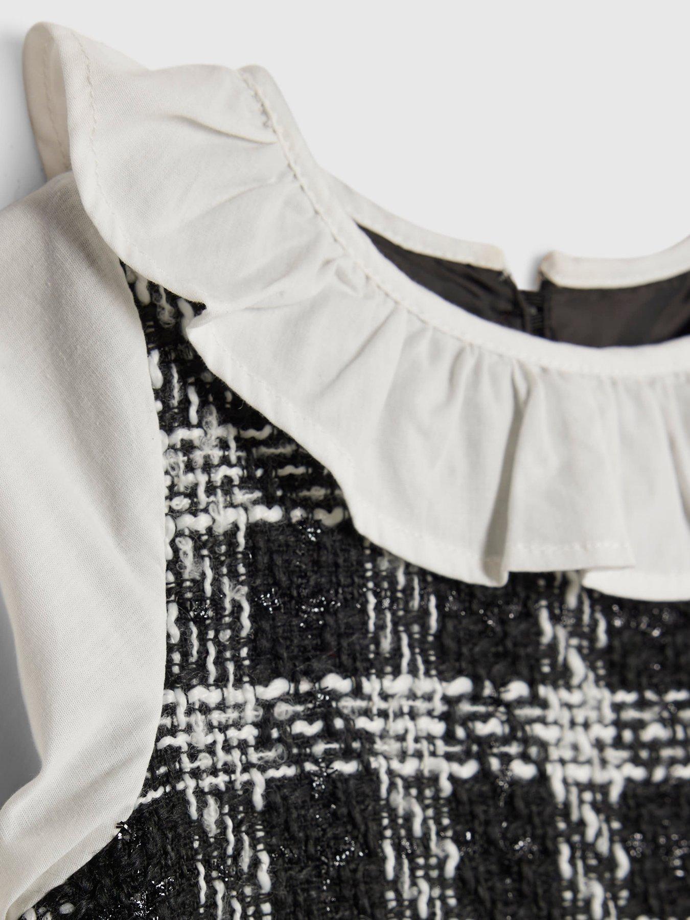  image of river-island-mini-girls-boucle-frill-peplum-top-black