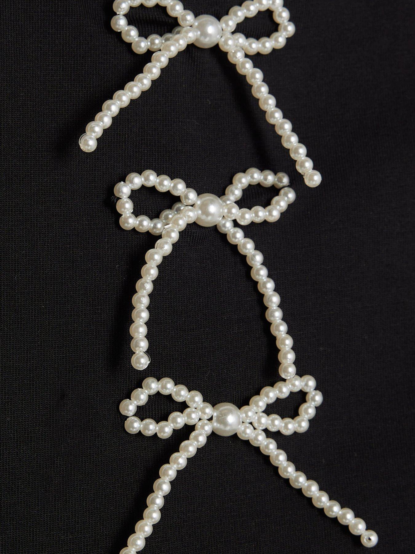  image of river-island-older-girls-bow-bubble-hem-tank-top-black