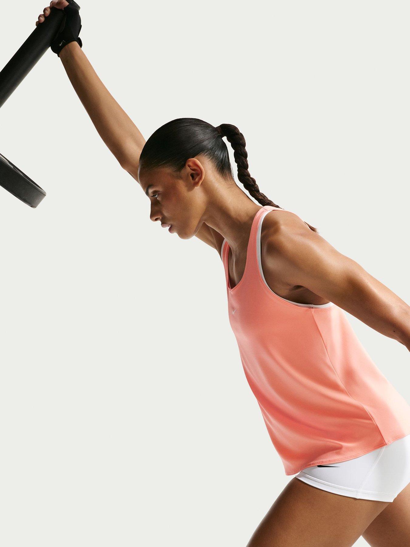  image of nike-womens-training-pro-dri-fit-elastika-tank-orange