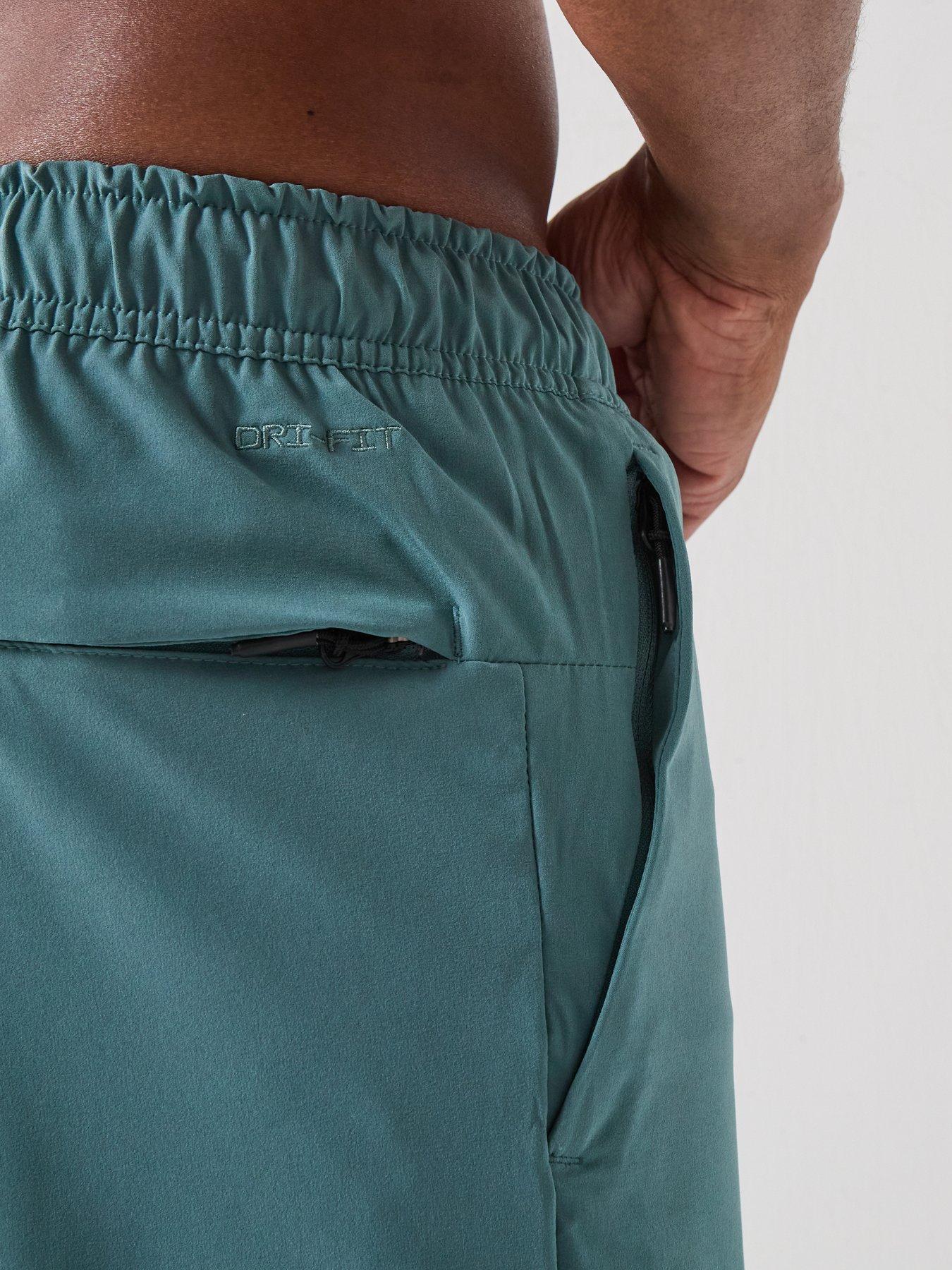 Image 5 of 7 of Nike Mens Training Dri-FIT Zippered Cuff Versatile Pants - Green