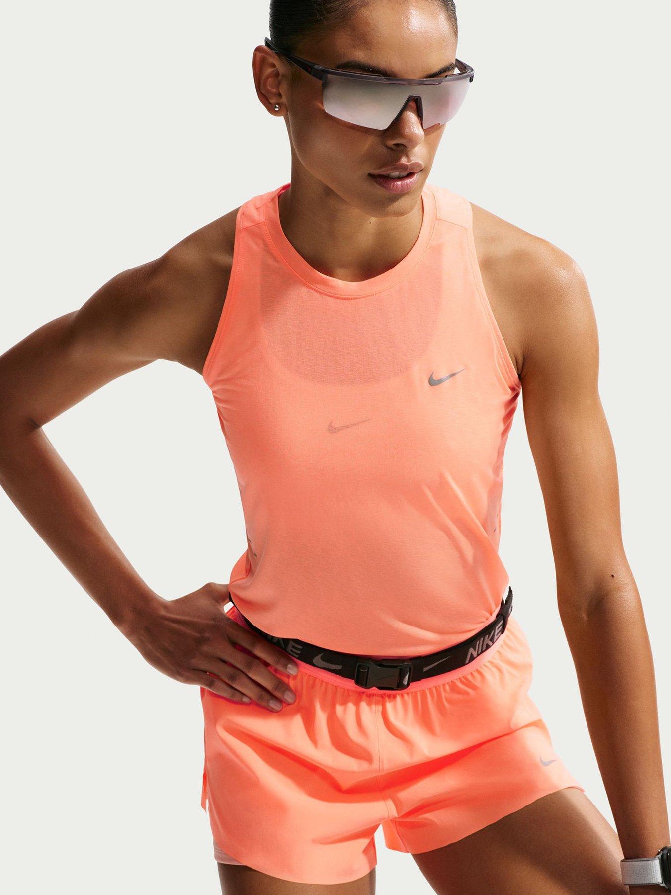 front image of nike-womens-running-breathe-tank-top-orange