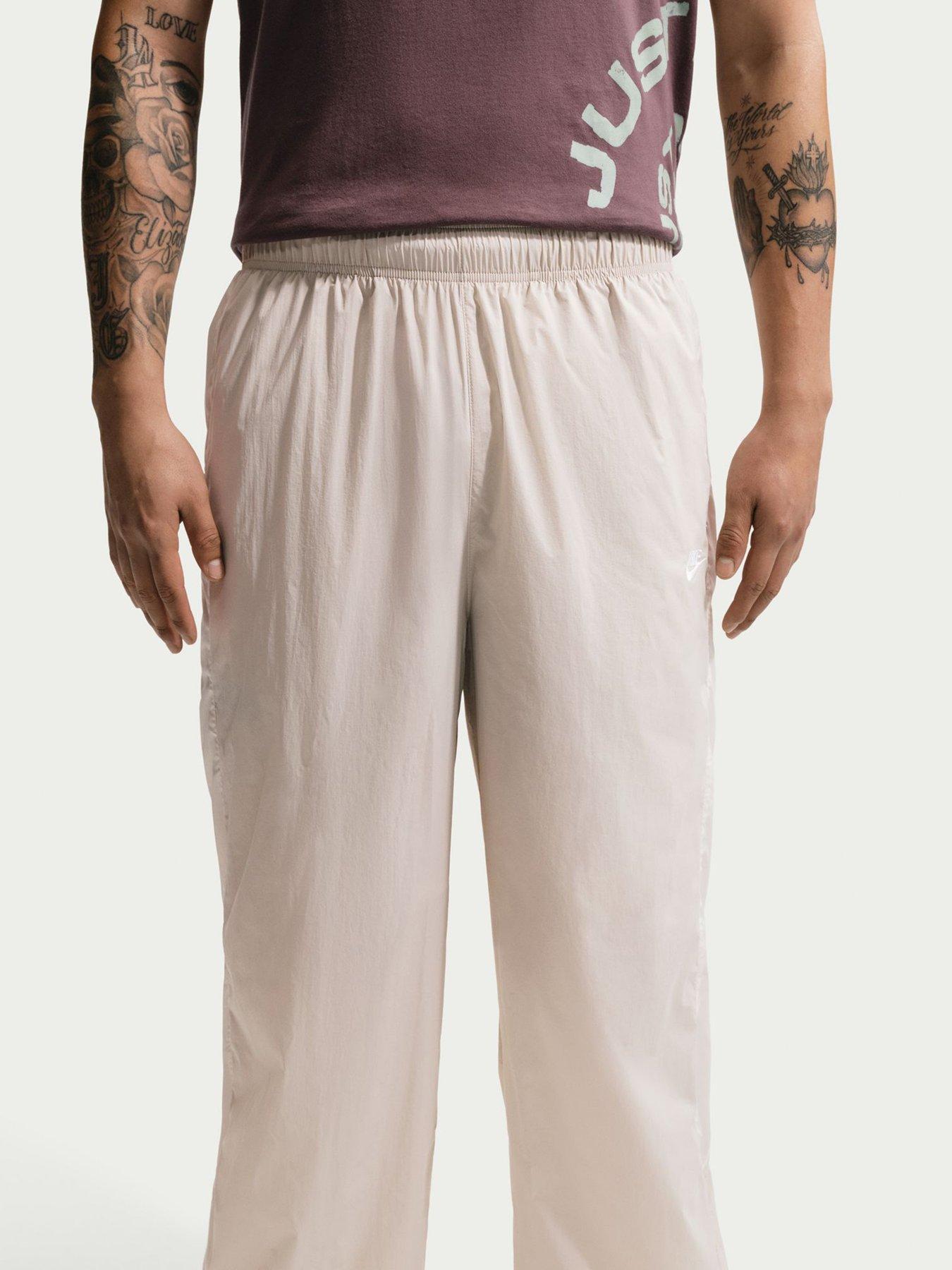  image of nike-mens-windrunner-lightweight-uv-pants-brown