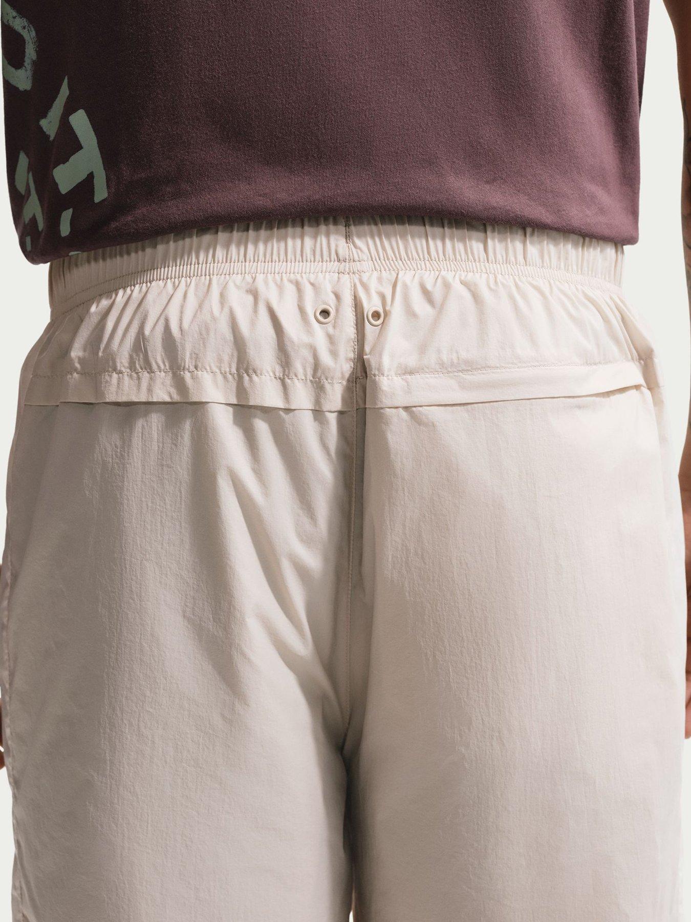  image of nike-mens-windrunner-lightweight-uv-pants-brown