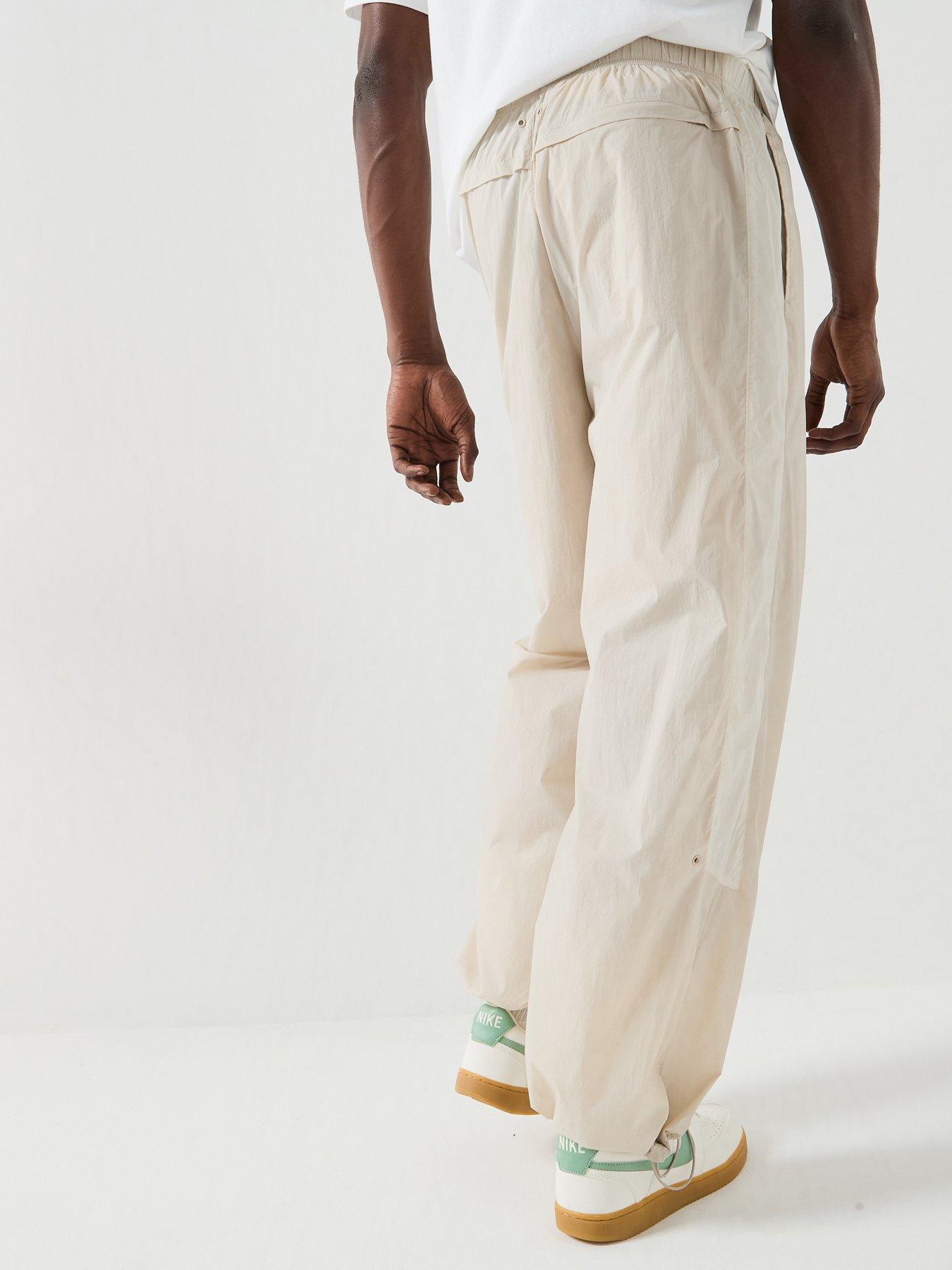 stillFront image of nike-mens-windrunner-lightweight-uv-pants-brown