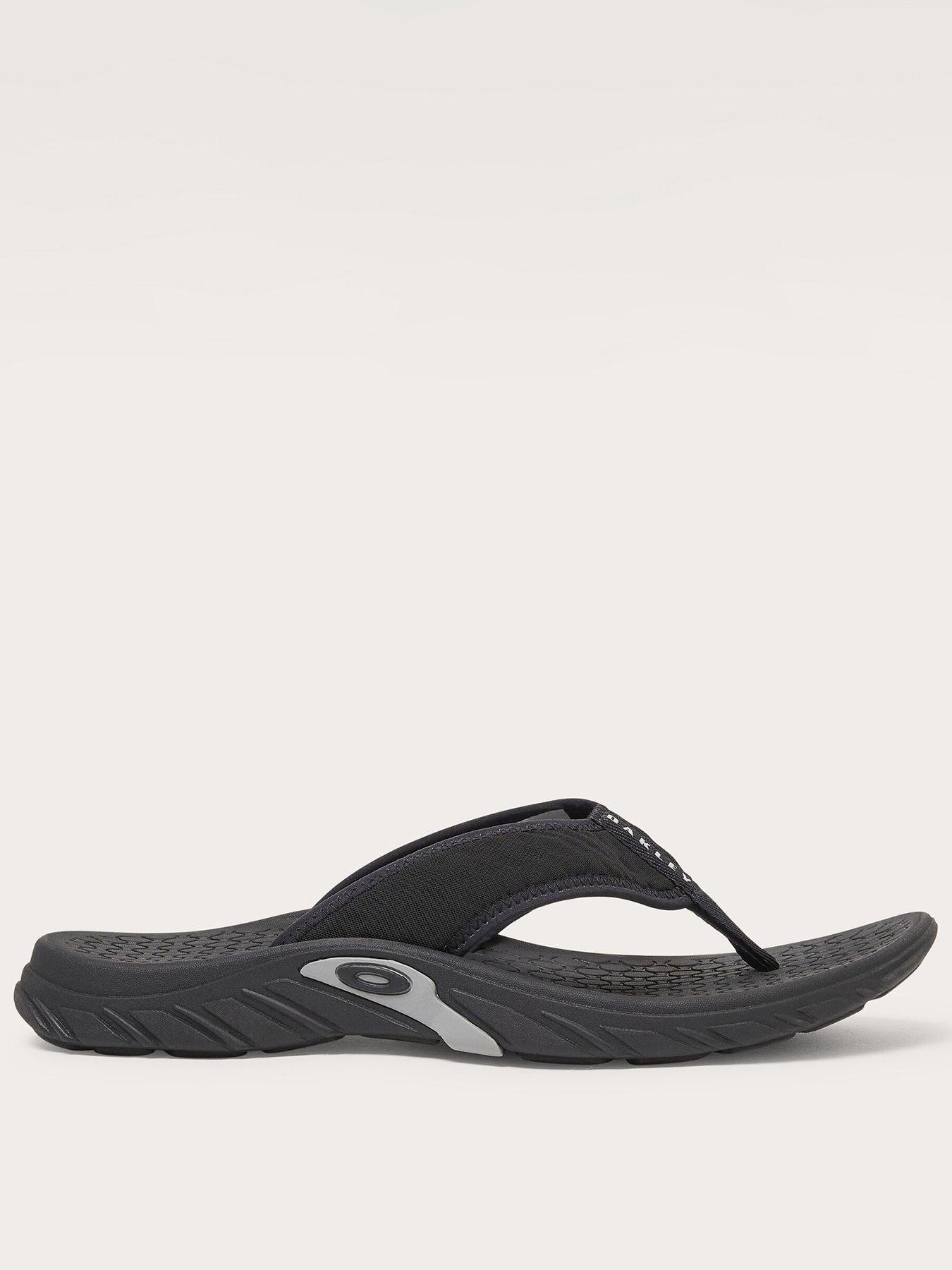 front image of oakley-mens-operative-flip-flops-black