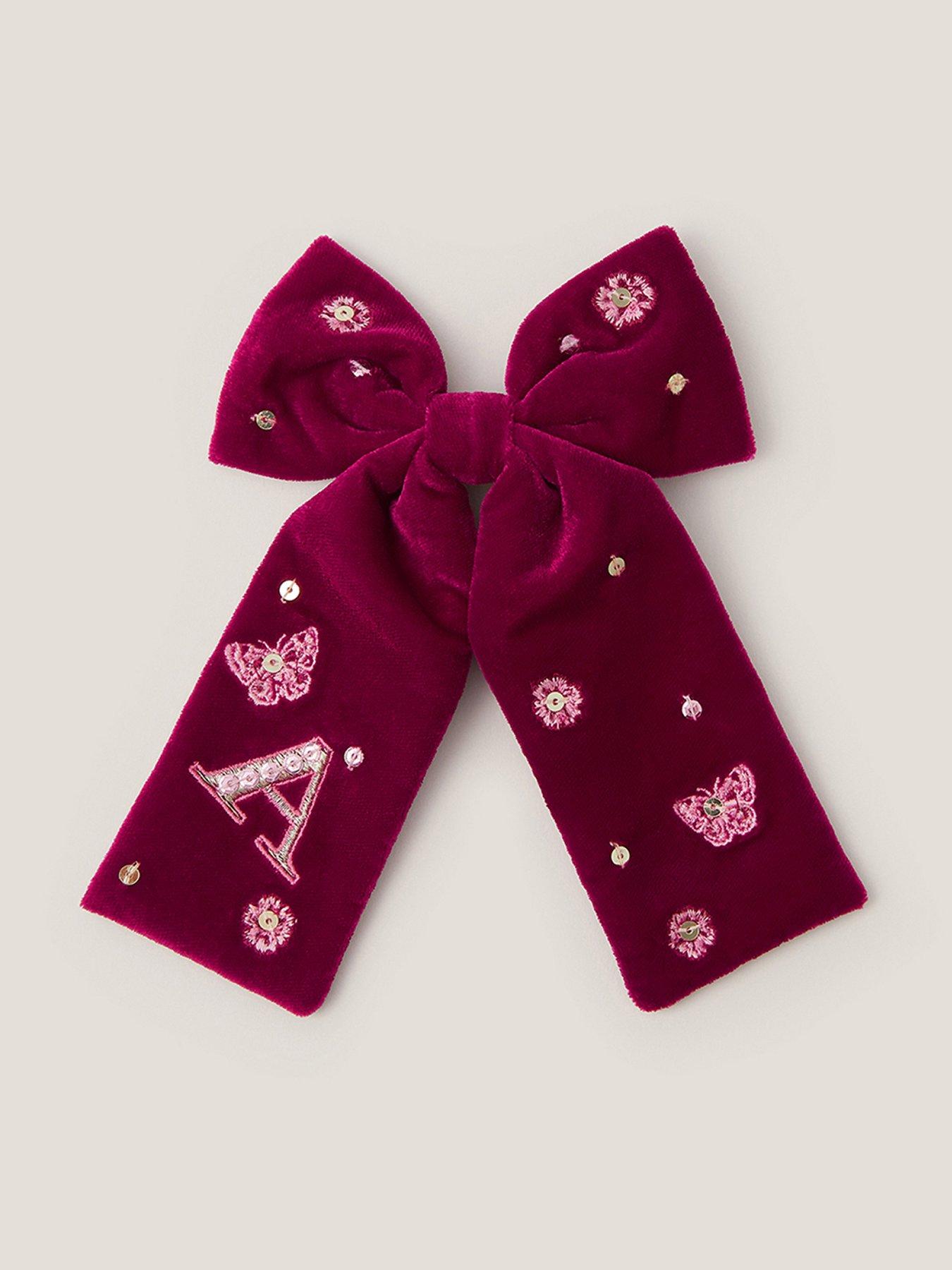  image of monsoon-girls-initial-bow-hair-clip-dark-red
