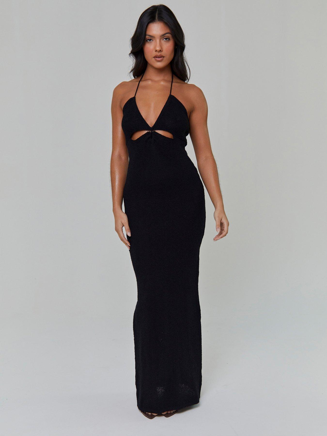 Image 1 of 3 of South Beach Knitted Halterneck Cut-Out Detail Maxi Dress - Black