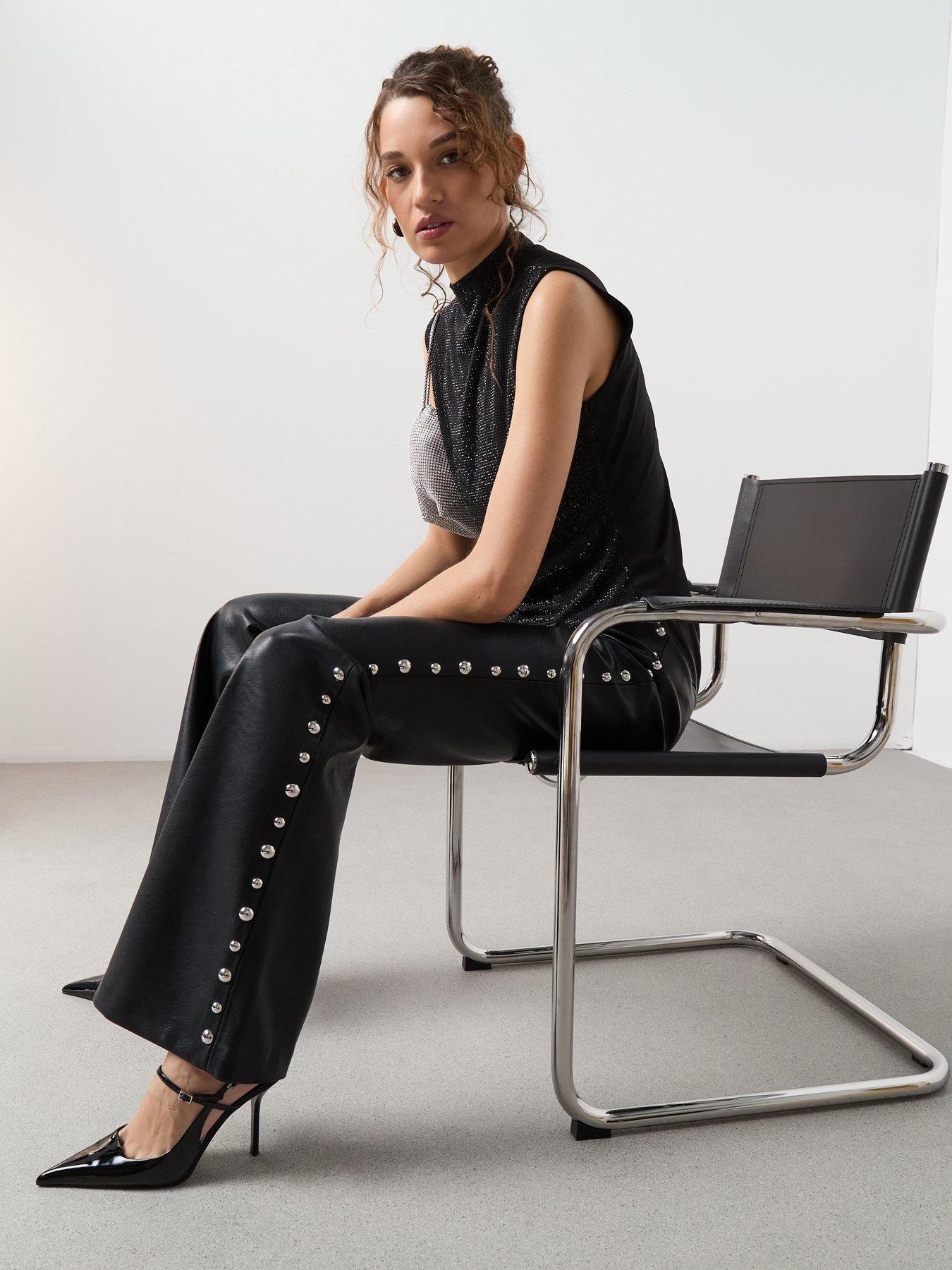  image of mango-studded-faux-leather-trousers-black