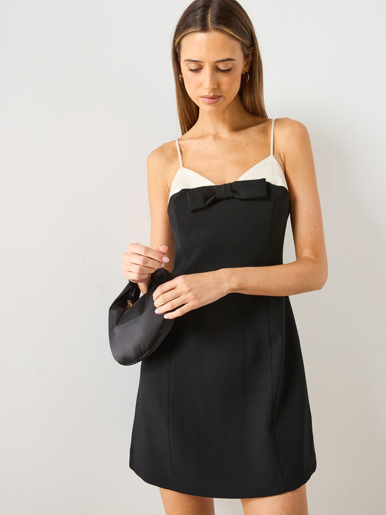 front image of mango-bow-contrasting-dress-black