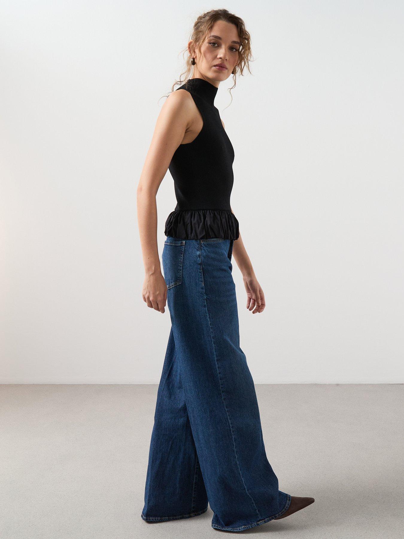  image of mango-peplum-high-neck-tank-top-black