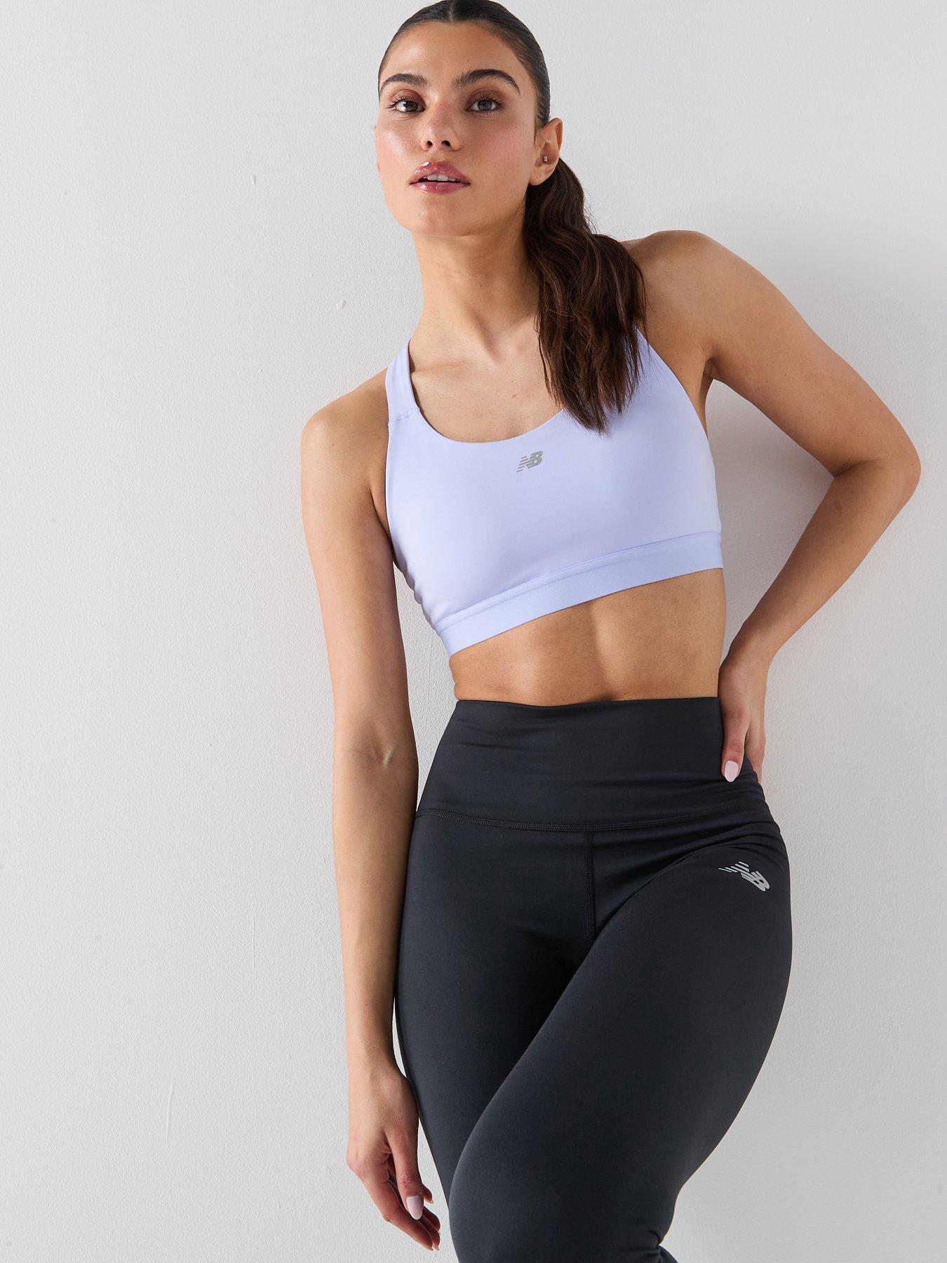 front image of new-balance-womens-training-essential-bra-blue