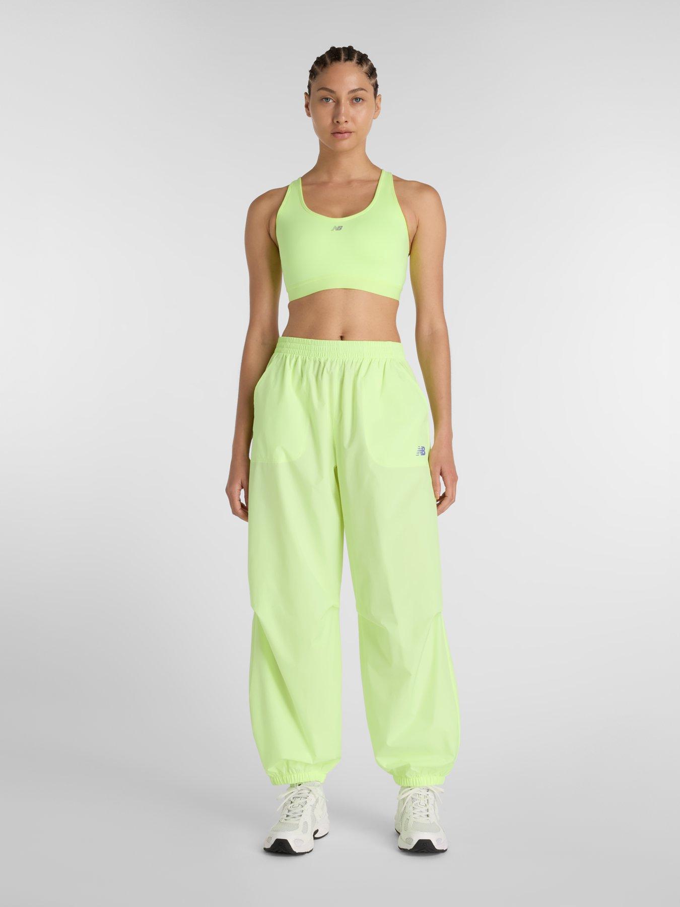  image of new-balance-womens-running-essential-bra-yellow