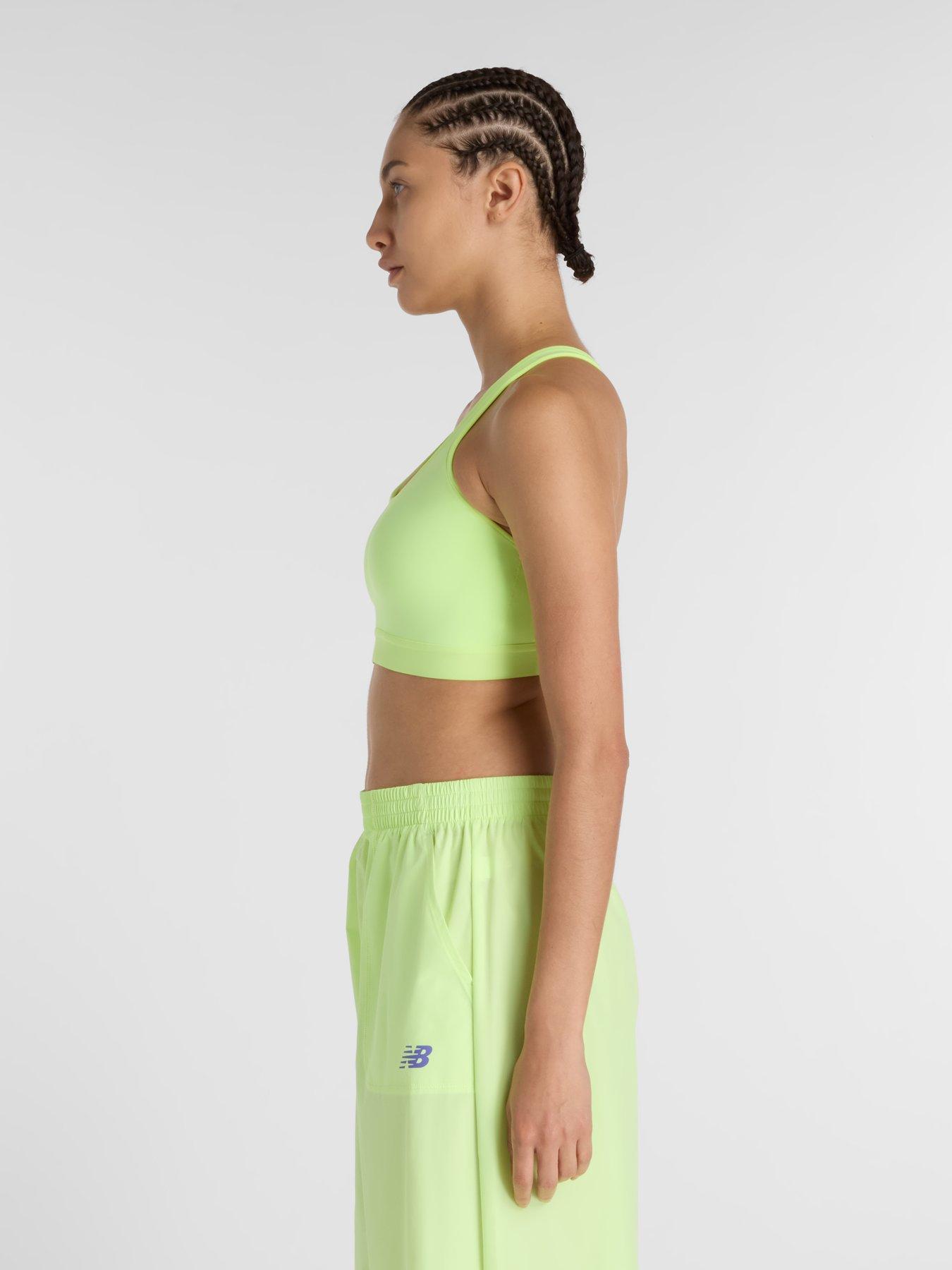  image of new-balance-womens-running-essential-bra-yellow